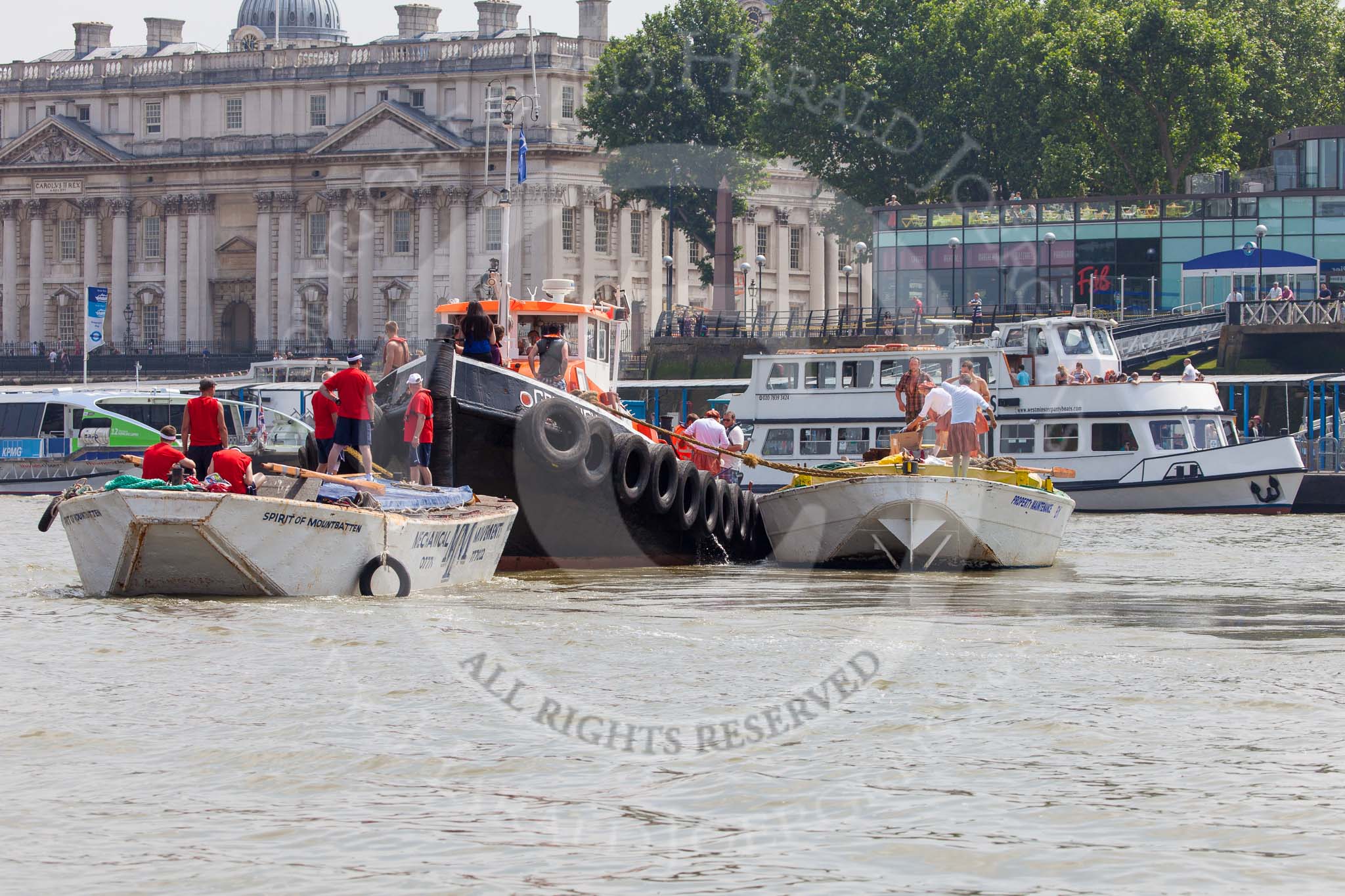 TOW River Thames Barge Driving Race 2013: Barge "Spirit of Mountabatten", by Mechanical Movements and Enabling Services Ltd, on the left, and barge "Hoppy", by GPS Fabrication.  on the right of GPS Marine tug "Vincia"..
River Thames between Greenwich and Westminster,
London,

United Kingdom,
on 13 July 2013 at 12:25, image #83