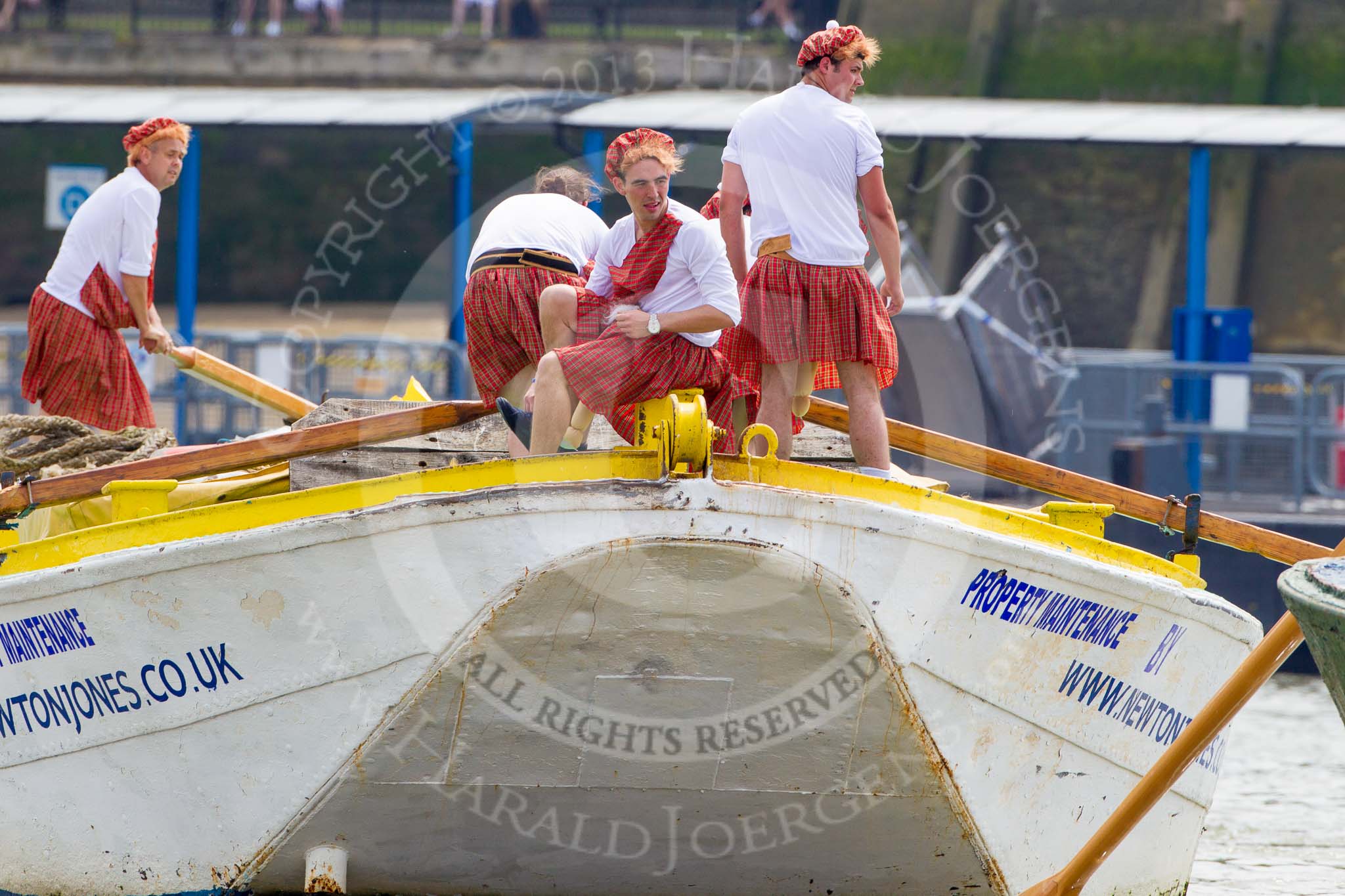 TOW River Thames Barge Driving Race 2013: The crew of barge "Hoppy", by GPS Fabrication, getting ready to row from the start..
River Thames between Greenwich and Westminster,
London,

United Kingdom,
on 13 July 2013 at 12:35, image #110