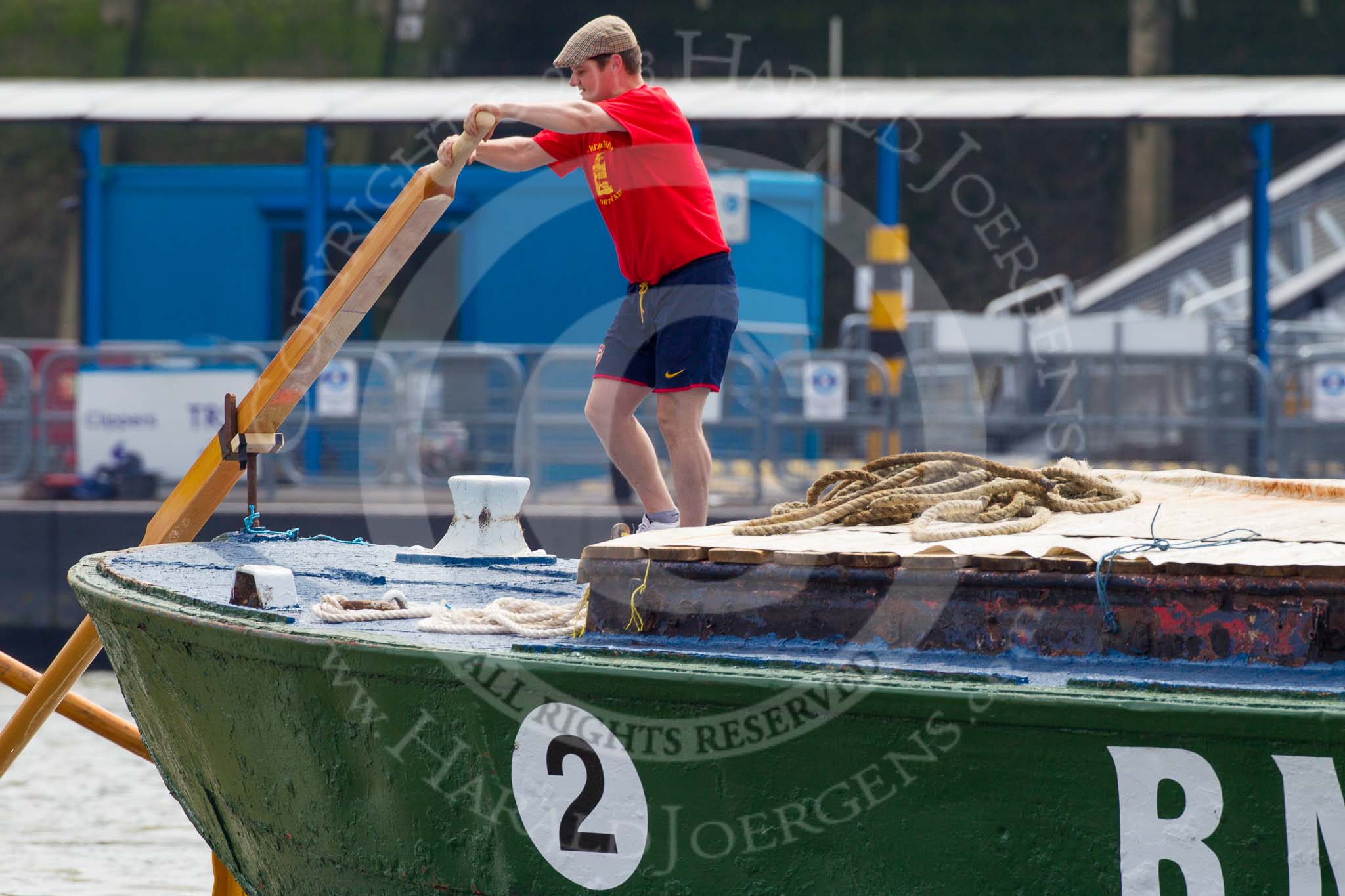 TOW River Thames Barge Driving Race 2013: The steerer of barge "Jane", by the RMT Union, after the start of the race..
River Thames between Greenwich and Westminster,
London,

United Kingdom,
on 13 July 2013 at 12:35, image #112