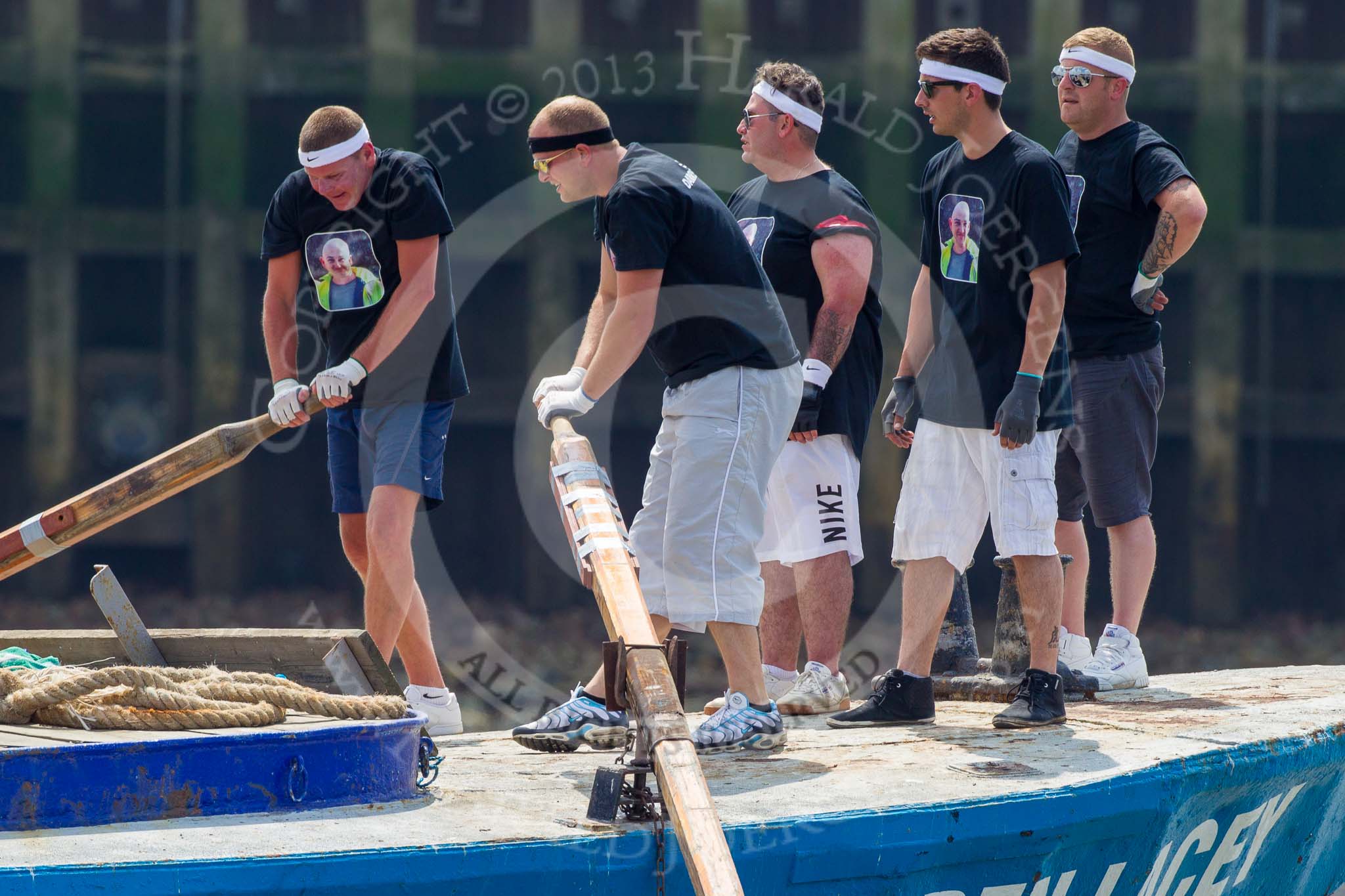 TOW River Thames Barge Driving Race 2013: The crew of barge "Darren Lacey", by Princess Pocahontas, rowing the barge from the start..
River Thames between Greenwich and Westminster,
London,

United Kingdom,
on 13 July 2013 at 12:36, image #118