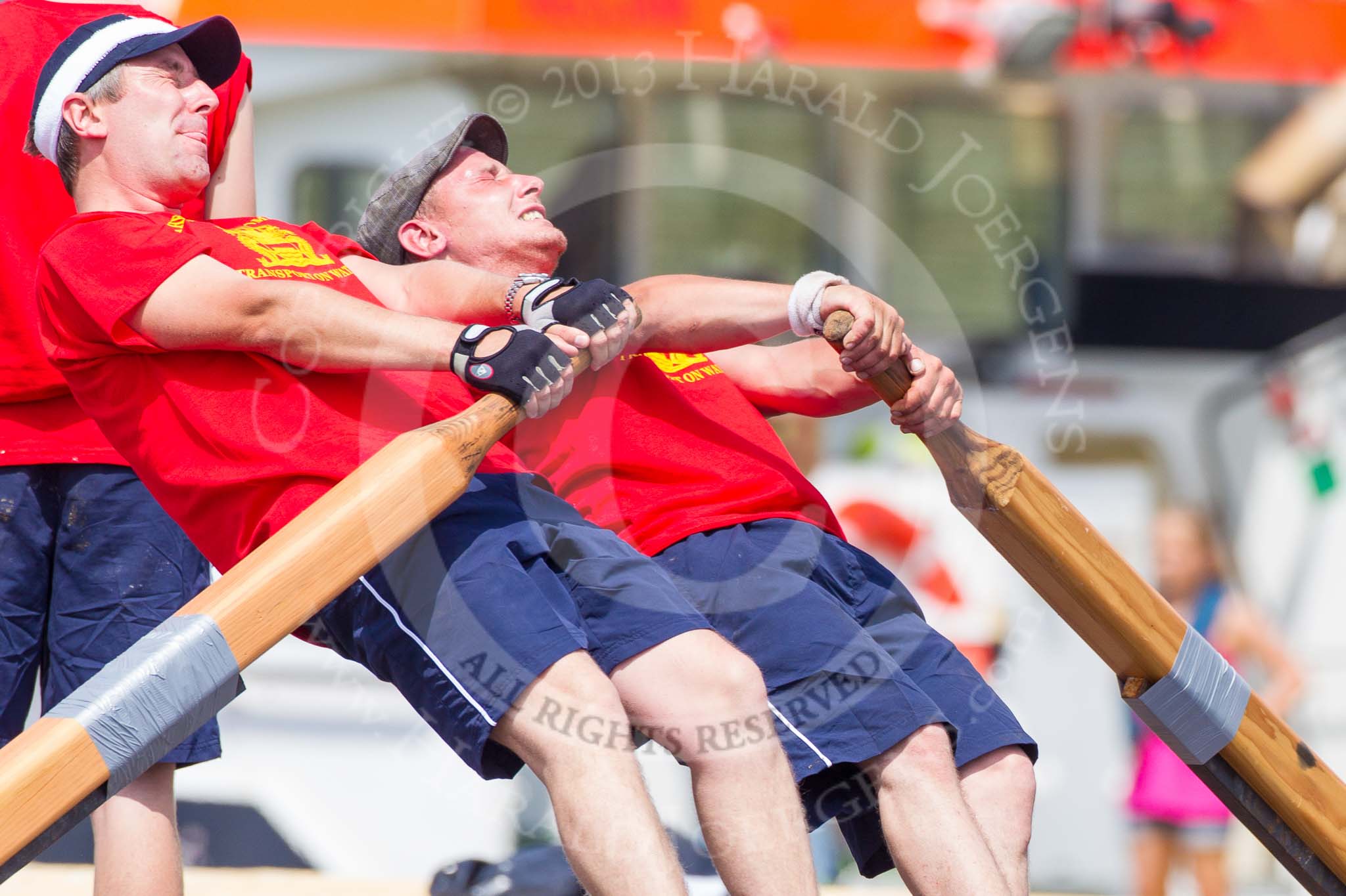 TOW River Thames Barge Driving Race 2013: Rowers on the deck of barge "Spirit of Mountabatten", by Mechanical Movements and Enabling Services Ltd, working hard during the race..
River Thames between Greenwich and Westminster,
London,

United Kingdom,
on 13 July 2013 at 12:39, image #153