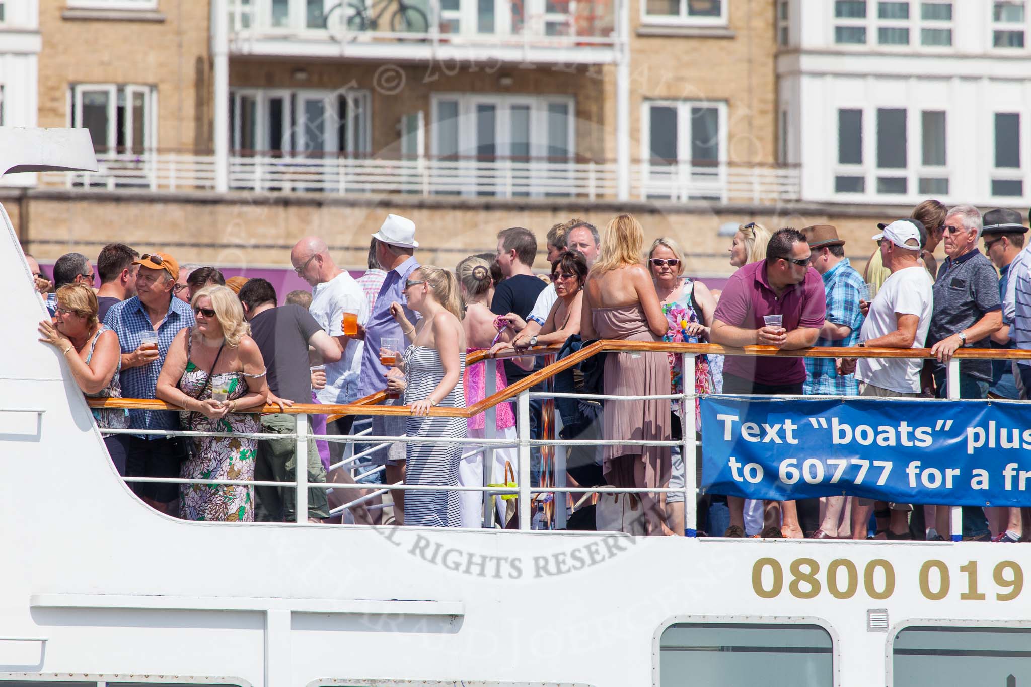 TOW River Thames Barge Driving Race 2013: Spectators on board of pleasure boat "Golden Jubilee" by Capital Pleasure Boats (www.cpbs.co.uk)..
River Thames between Greenwich and Westminster,
London,

United Kingdom,
on 13 July 2013 at 12:41, image #163