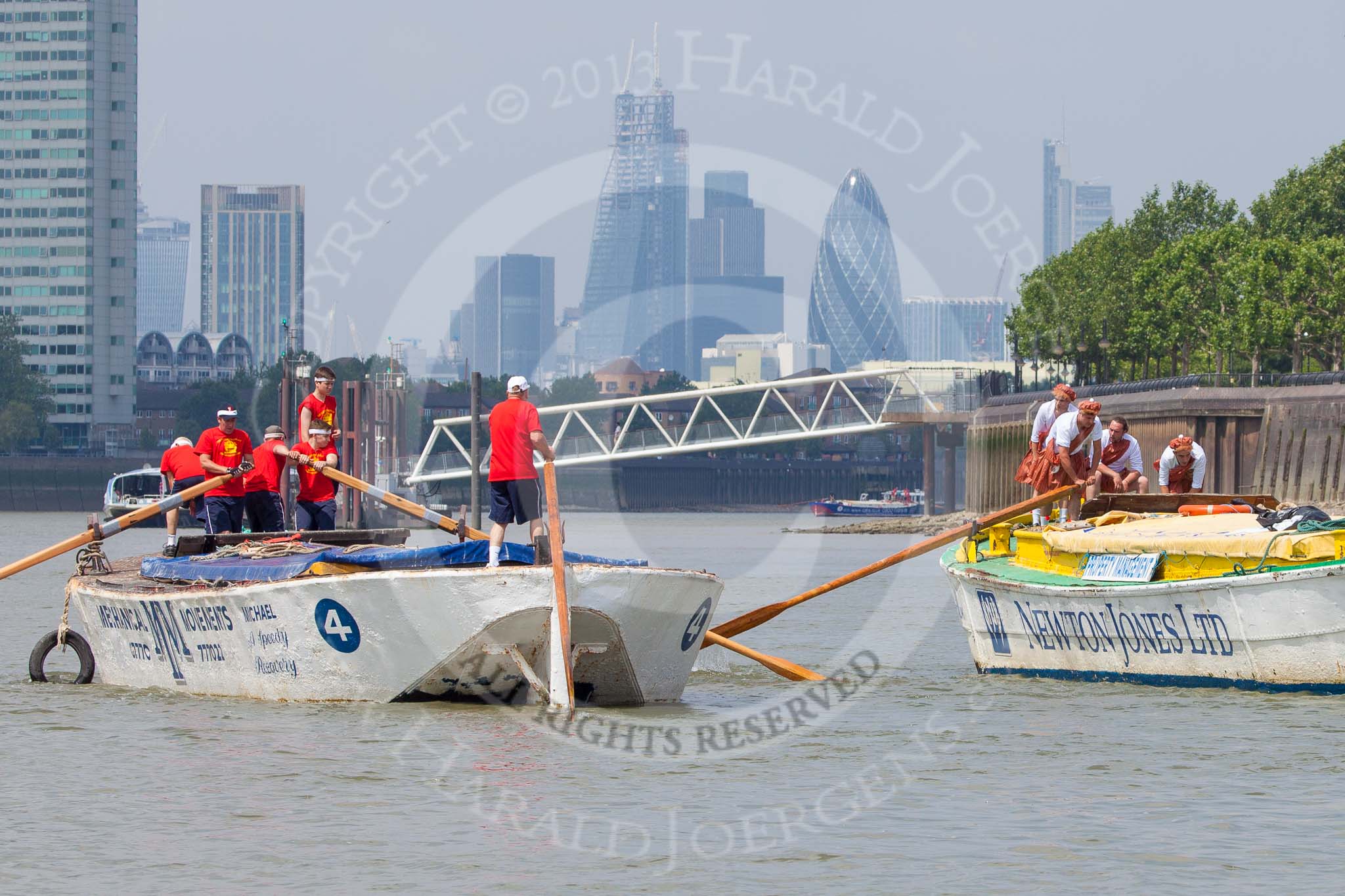 TOW River Thames Barge Driving Race 2013: Barge "Hoppy", by GPS Fabrication, approaching Masthouse Terrace Pier. On the left barge "Spirit of Mountabatten", by Mechanical Movements and Enabling Services Ltd. In the background the skyscrapers of the City of London..
River Thames between Greenwich and Westminster,
London,

United Kingdom,
on 13 July 2013 at 12:41, image #170