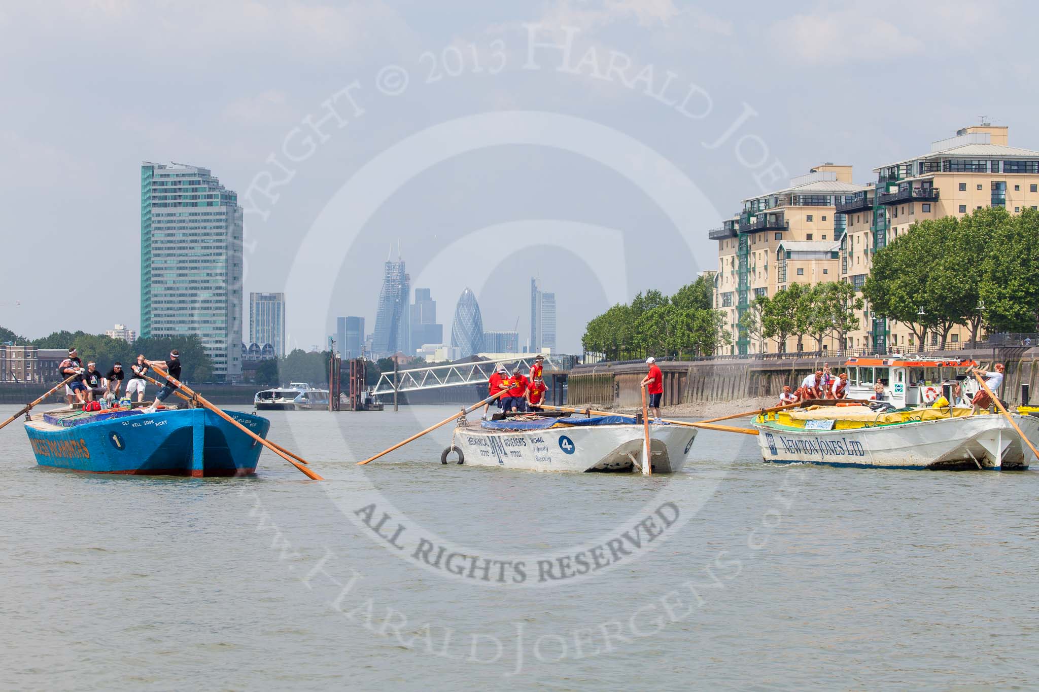 TOW River Thames Barge Driving Race 2013: Three barges abreast - from left "Darren Lacey", by Princess Pocahontas, "Spirit of Mountabatten", by Mechanical Movements and Enabling Services Ltd, and "Hoppy", by GPS Fabrication, approaching Masthouse Terrace Pier. In the background the skyscrapers in the City of London..
River Thames between Greenwich and Westminster,
London,

United Kingdom,
on 13 July 2013 at 12:41, image #173