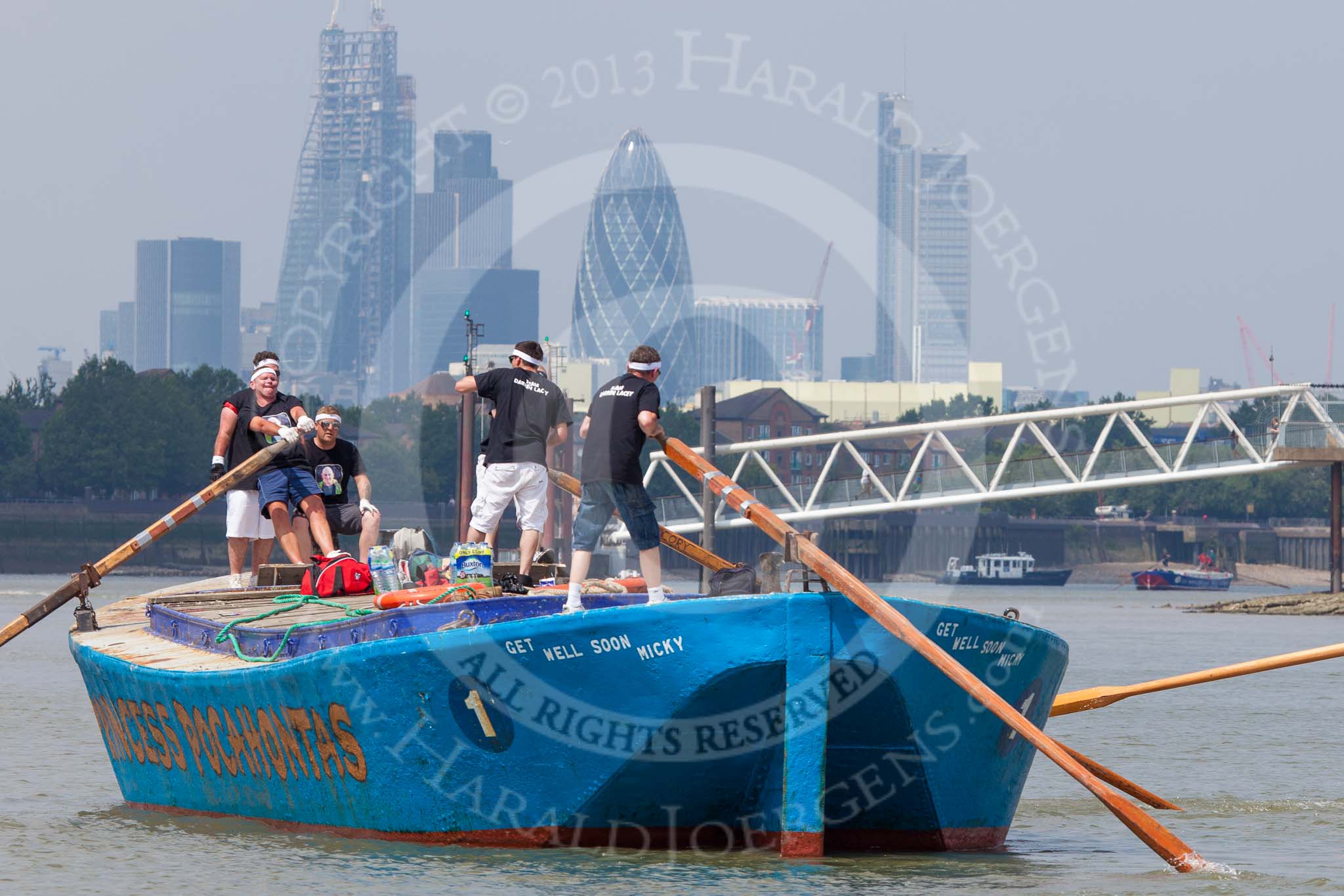 TOW River Thames Barge Driving Race 2013: Rear view of barge "Darren Lacey", by Princess Pocahontas, during the race, approaching MasthouseTerrace Pier. In the background the skyscrapers of the City of London, including the "Gherkin"..
River Thames between Greenwich and Westminster,
London,

United Kingdom,
on 13 July 2013 at 12:41, image #175