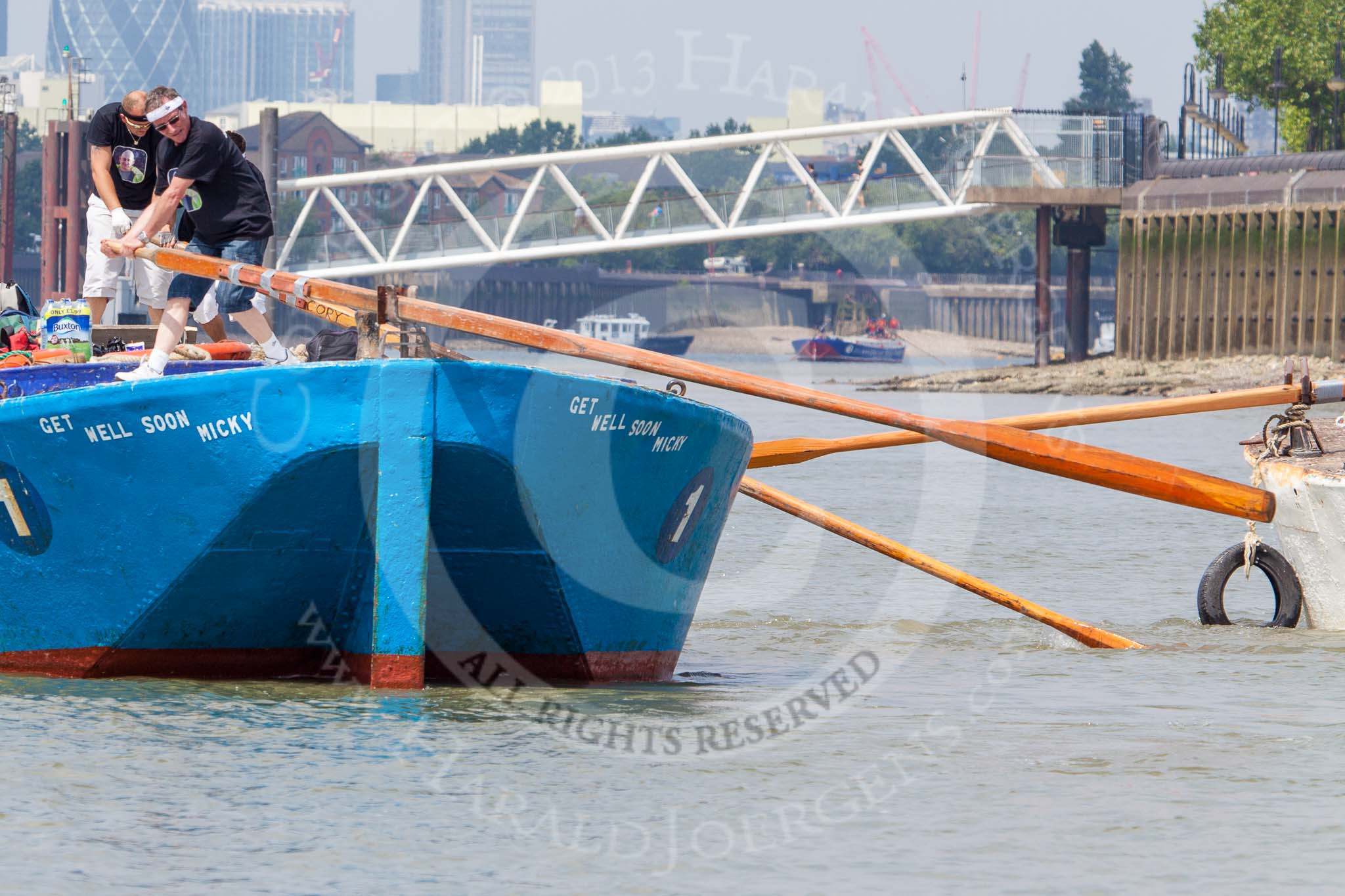 TOW River Thames Barge Driving Race 2013: Rear view of barge "Darren Lacey", by Princess Pocahontas, during the race, approching Masthouse Terrace Pier.  On the right is barge "Spirit of Mountabatten", by Mechanical Movements and Enabling Services Ltd..
River Thames between Greenwich and Westminster,
London,

United Kingdom,
on 13 July 2013 at 12:42, image #177