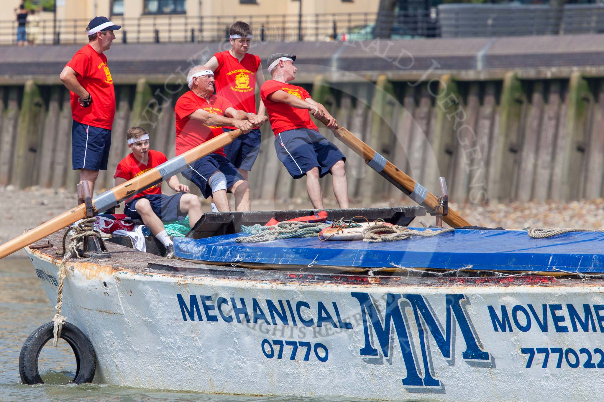 TOW River Thames Barge Driving Race 2013: Rowers on the deck of of barge "Spirit of Mountabatten", by Mechanical Movements and Enabling Services Ltd..
River Thames between Greenwich and Westminster,
London,

United Kingdom,
on 13 July 2013 at 12:43, image #186