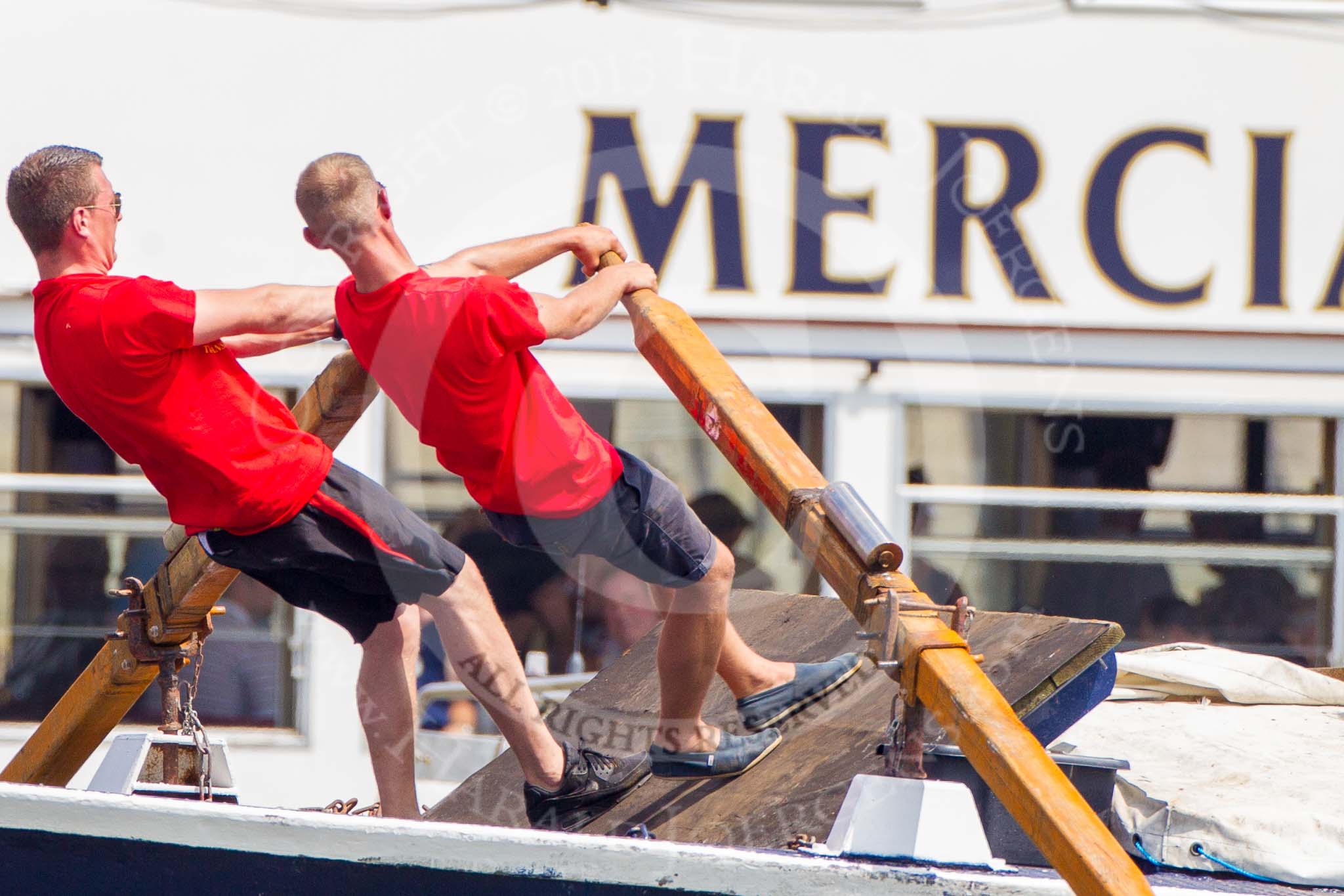 TOW River Thames Barge Driving Race 2013: Rowers working hard on board of barge "Benjamin", by London Party Boats. In the background pleasure boat "Mercia"..
River Thames between Greenwich and Westminster,
London,

United Kingdom,
on 13 July 2013 at 12:47, image #208