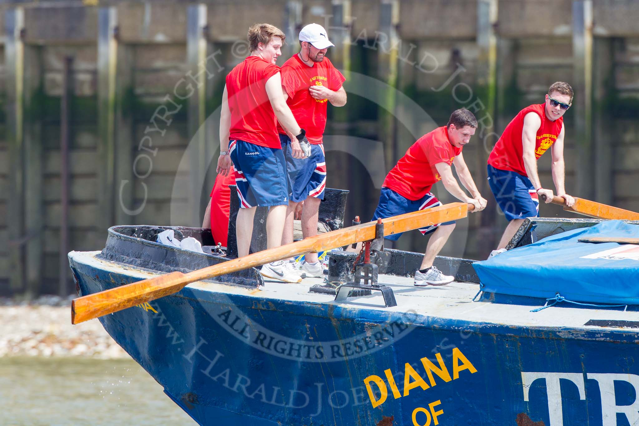 TOW River Thames Barge Driving Race 2013: The rowers at the bow of barge "Diana", by Trinity Buoy Wharf, during the race..
River Thames between Greenwich and Westminster,
London,

United Kingdom,
on 13 July 2013 at 12:59, image #253