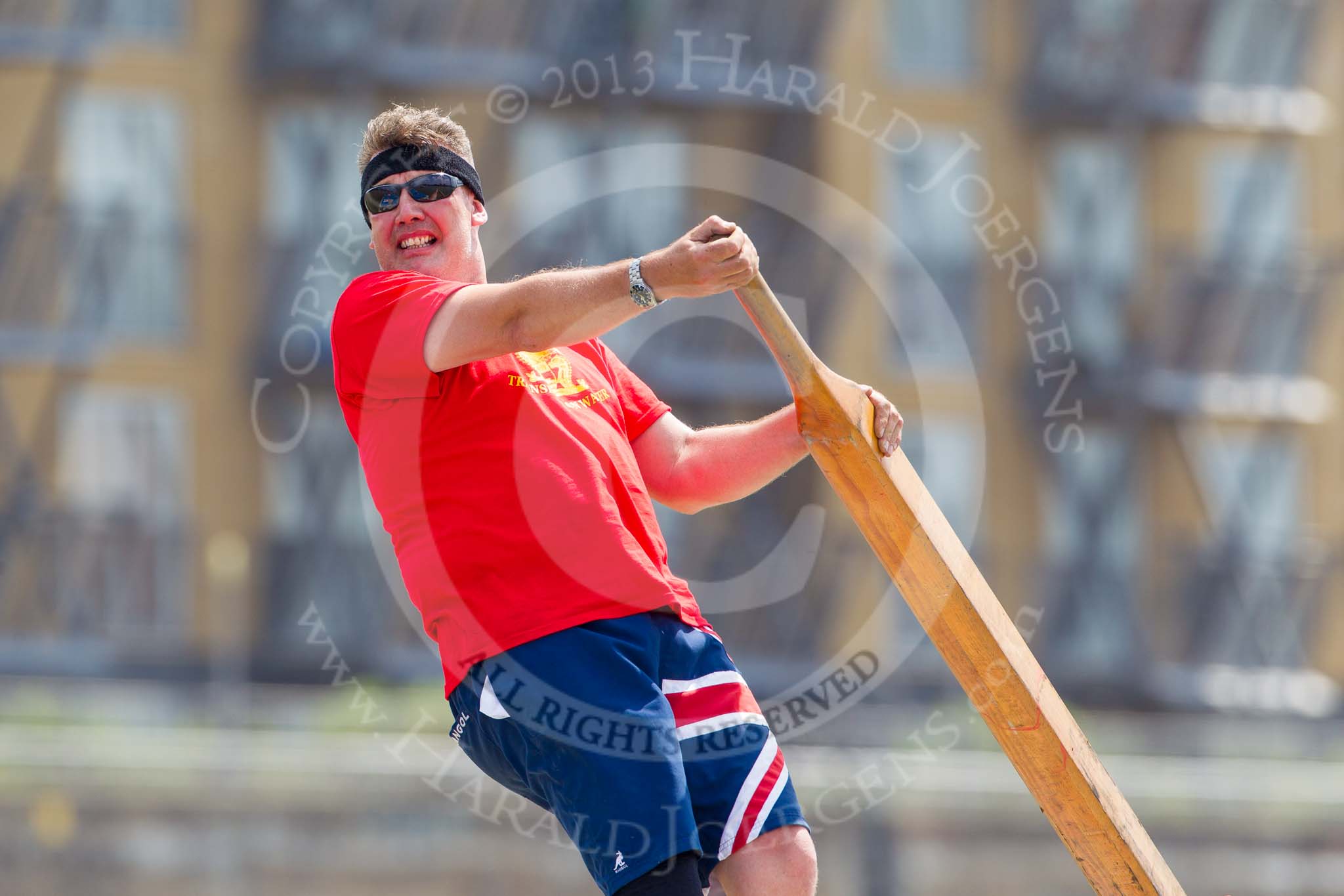 TOW River Thames Barge Driving Race 2013: The steerer on barge "Diana", by Trinity Buoy Wharf..
River Thames between Greenwich and Westminster,
London,

United Kingdom,
on 13 July 2013 at 13:00, image #255