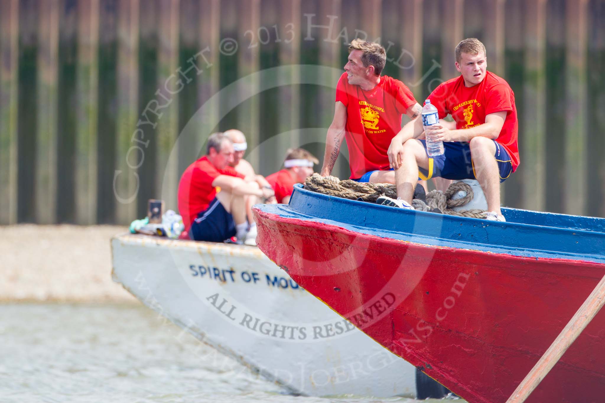 Photo 1307131307511D44745HaraldJoergens TOW River Thames Barge Driving Race 2013: Crews sitting at the bow of barge "Jane", by the RMT Union, and barge "Spirit of Mountabatten", by Mechanical Movements and Enabling Services Ltd, behind..
River Thames between Greenwich and Westminster,
London,
United Kingdom,
on 13 July 2013 at 13:07, image #276