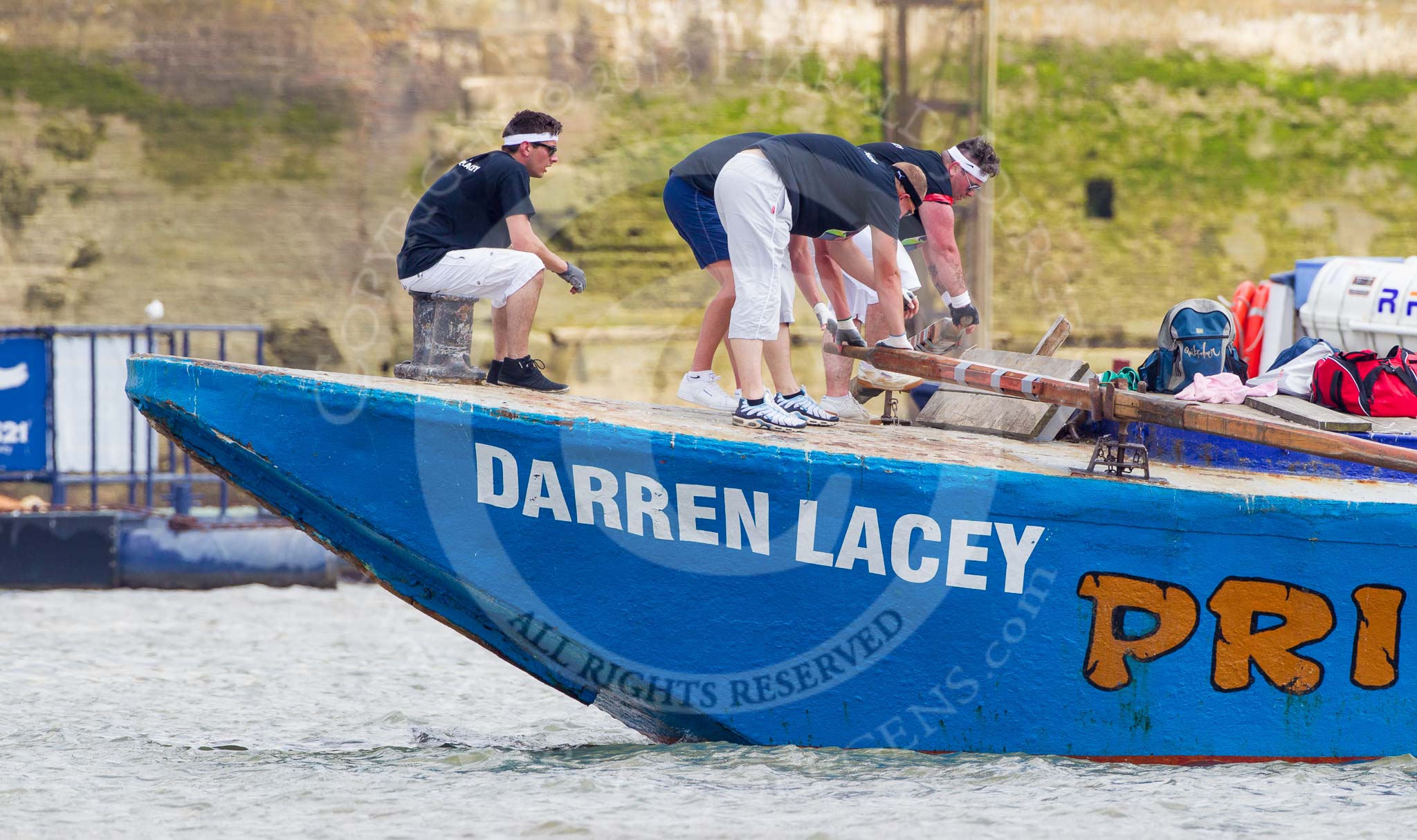 TOW River Thames Barge Driving Race 2013: Rowers at the bow of barge "Darren Lacey", by Princess Pocahontas, during the race..
River Thames between Greenwich and Westminster,
London,

United Kingdom,
on 13 July 2013 at 13:13, image #289