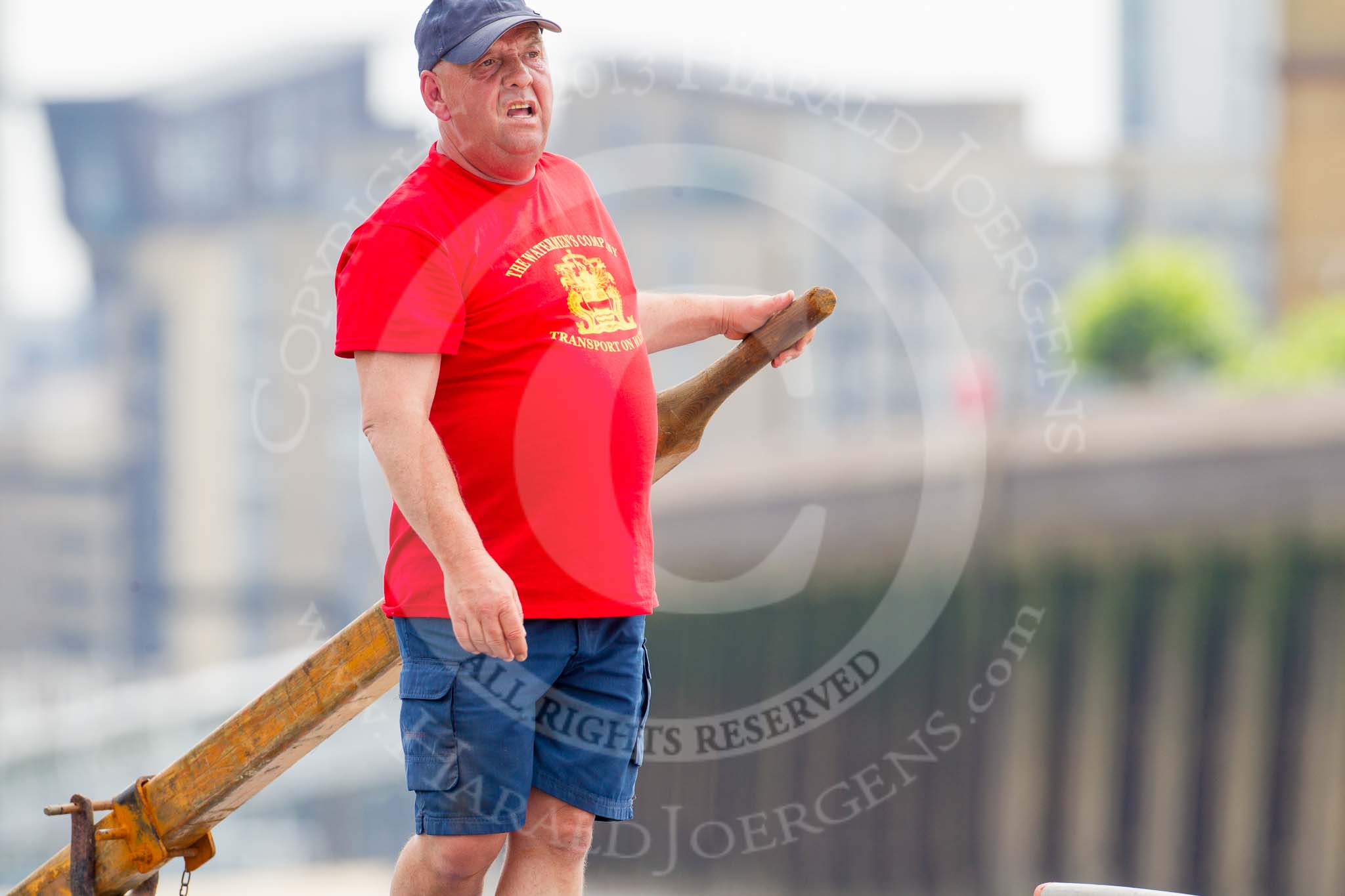TOW River Thames Barge Driving Race 2013: The steerer on board of barge "Benjamin", by London Party Boats..
River Thames between Greenwich and Westminster,
London,

United Kingdom,
on 13 July 2013 at 13:18, image #310