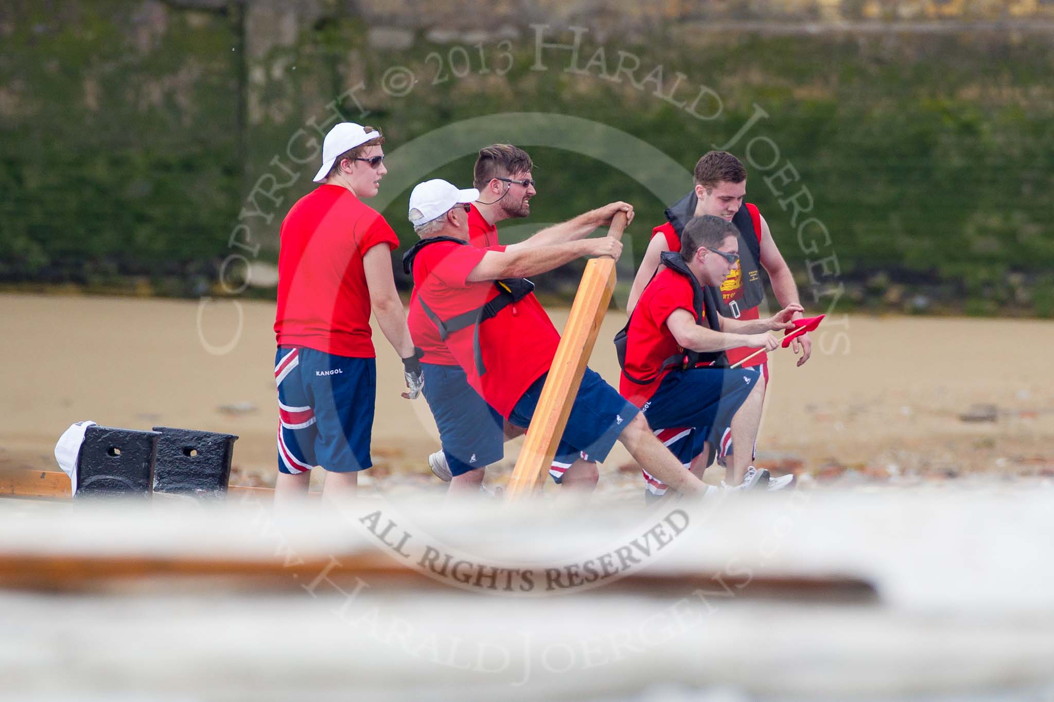 TOW River Thames Barge Driving Race 2013: Collecting a pennant from a moored barge - crew members of Barge "Diana", by Trinity Buoy Wharf..
River Thames between Greenwich and Westminster,
London,

United Kingdom,
on 13 July 2013 at 13:25, image #333