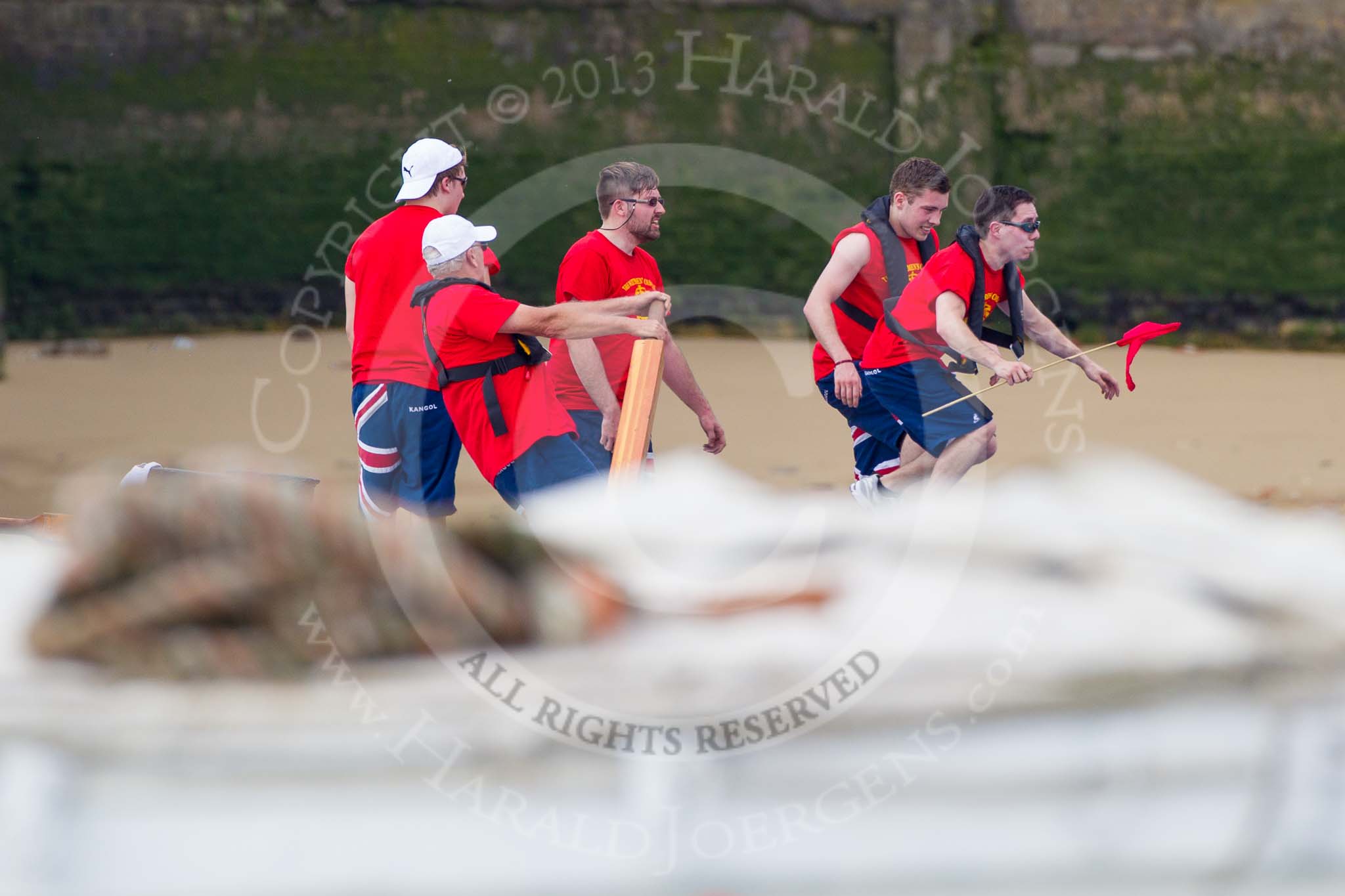 TOW River Thames Barge Driving Race 2013: Collecting a pennant from a moored barge - crew members of Barge "Diana", by Trinity Buoy Wharf..
River Thames between Greenwich and Westminster,
London,

United Kingdom,
on 13 July 2013 at 13:25, image #334