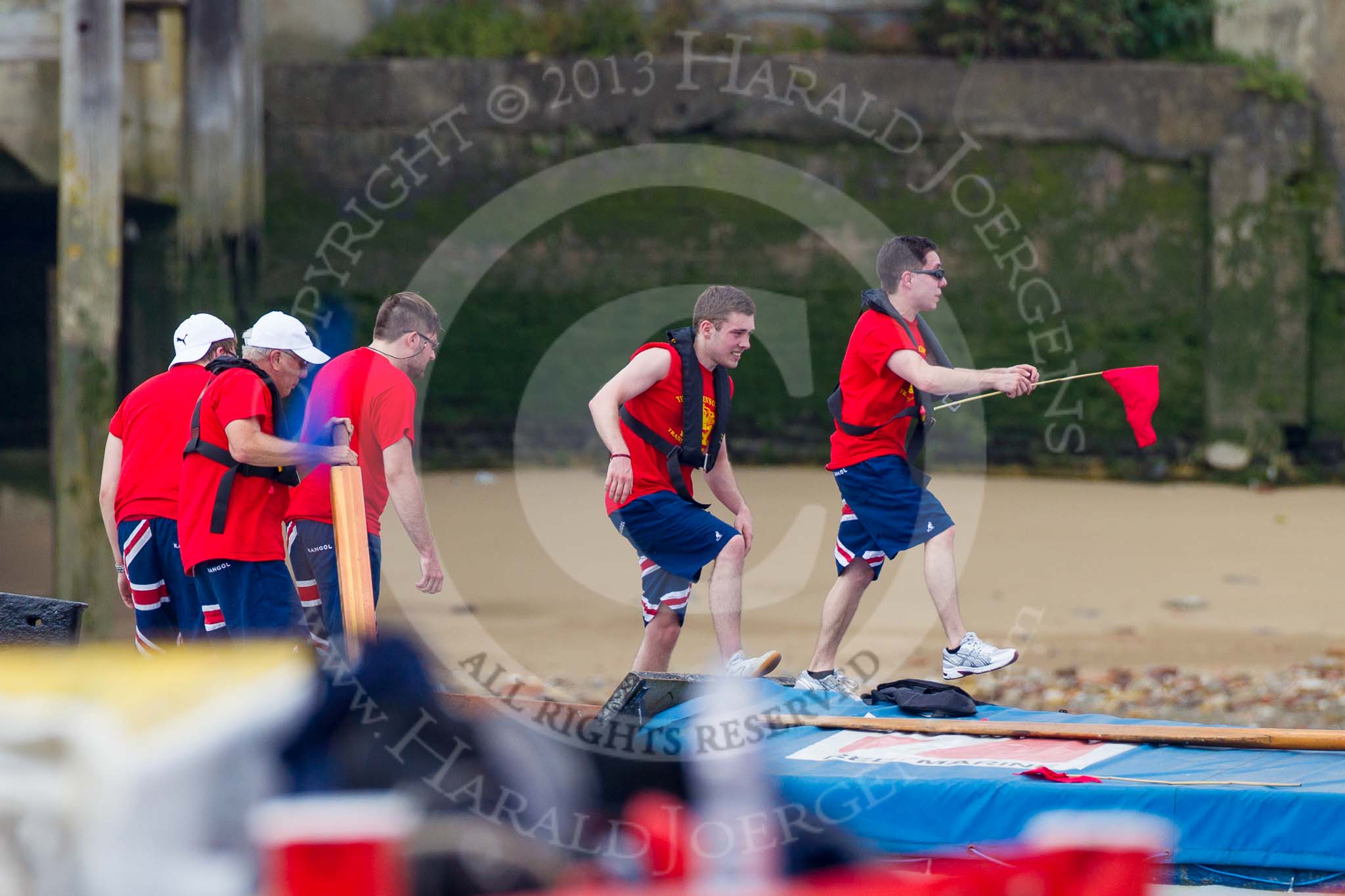 TOW River Thames Barge Driving Race 2013: Collecting a pennant from a moored barge - crew members of Barge "Diana", by Trinity Buoy Wharf..
River Thames between Greenwich and Westminster,
London,

United Kingdom,
on 13 July 2013 at 13:25, image #335