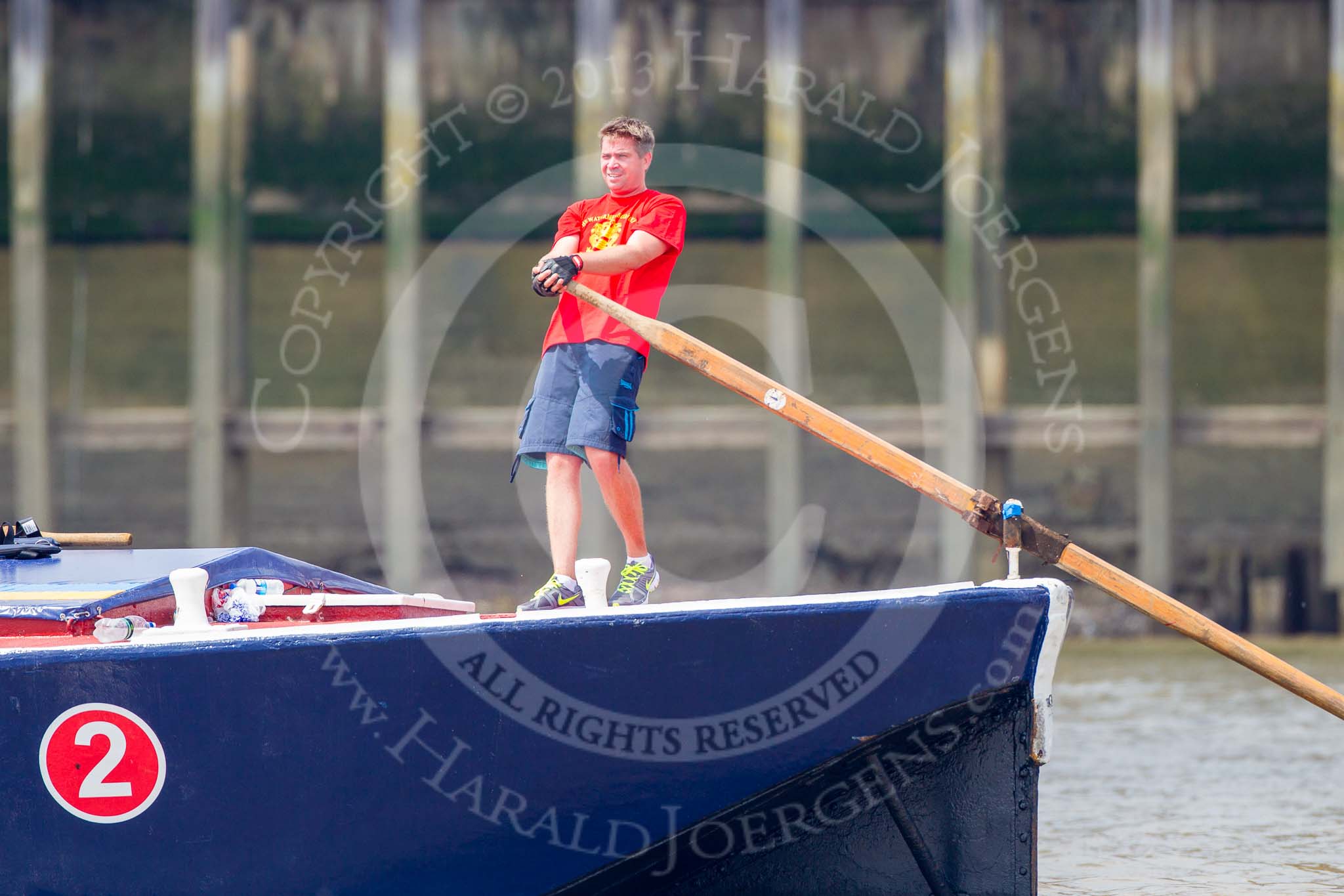 TOW River Thames Barge Driving Race 2013: The steerer of barge "Blackwall", by the Port of London Authority, during the race..
River Thames between Greenwich and Westminster,
London,

United Kingdom,
on 13 July 2013 at 13:27, image #344