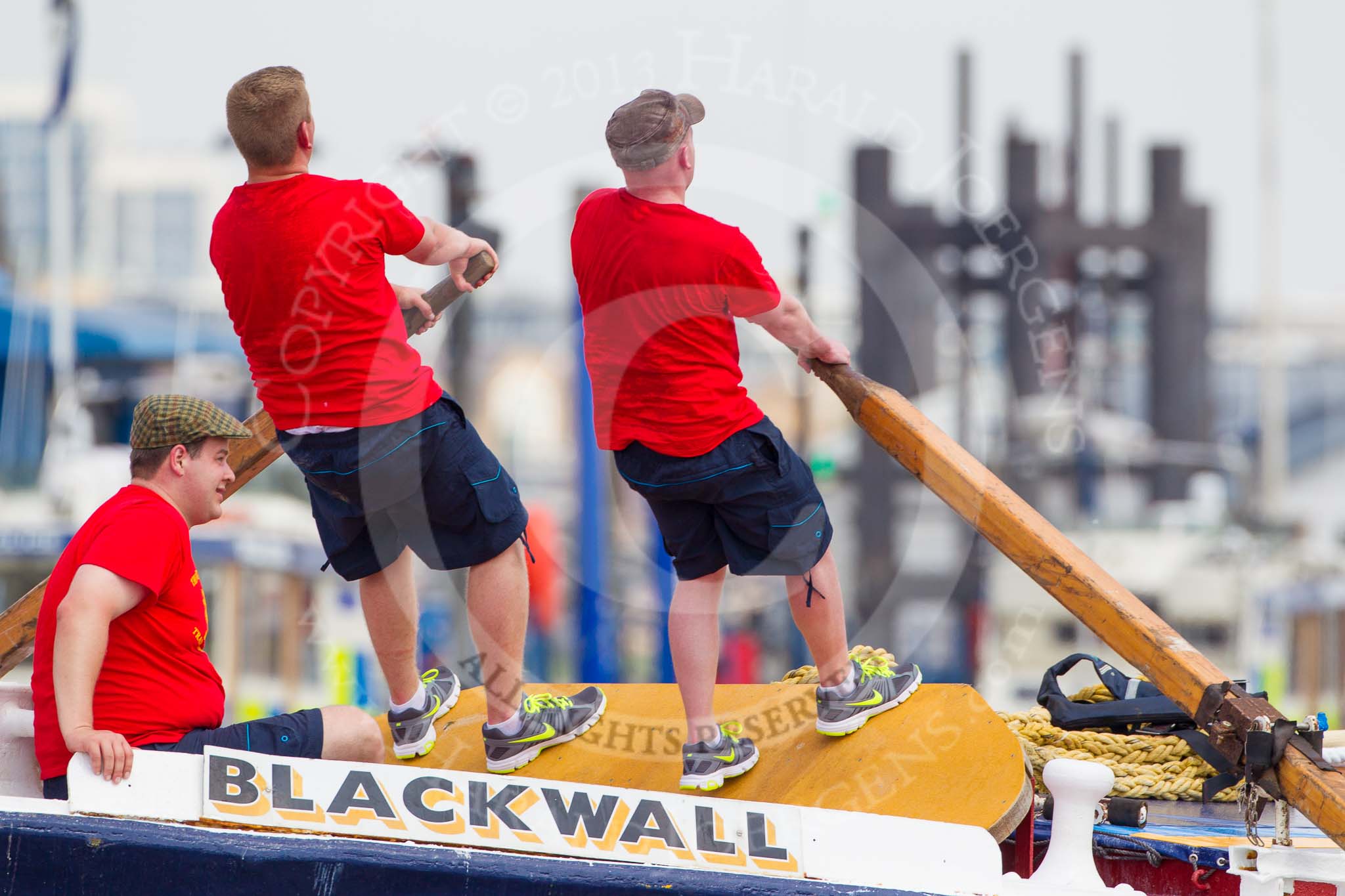 TOW River Thames Barge Driving Race 2013: Rowers on the deck of barge "Blackwall", by the Port of London Authority, during the race..
River Thames between Greenwich and Westminster,
London,

United Kingdom,
on 13 July 2013 at 13:32, image #357