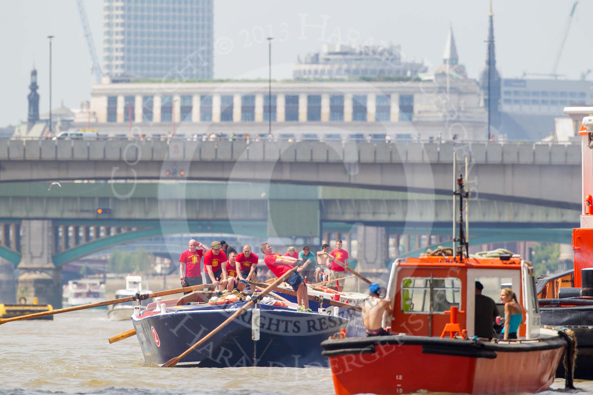 TOW River Thames Barge Driving Race 2013: Barge "Blackwall", by the Port of London Authority, approaching London Bridge and Cannon Street Railway Bridge. In front is barge "Steve Faldo" by Capital Pleasure Boats..
River Thames between Greenwich and Westminster,
London,

United Kingdom,
on 13 July 2013 at 13:45, image #386