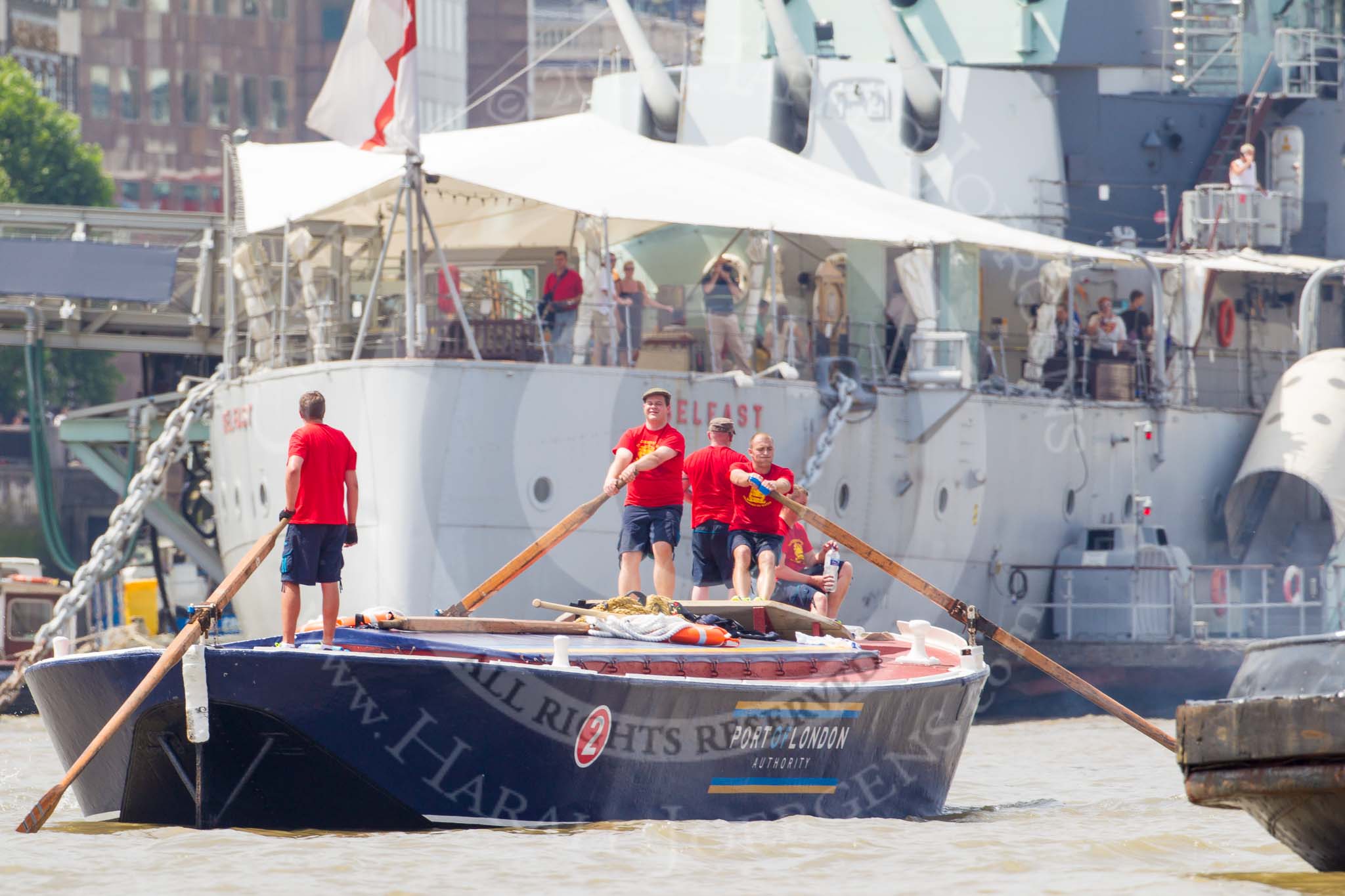 TOW River Thames Barge Driving Race 2013: Barge "Blackwall", by the Port of London Authority,approaching HMS Belfast..
River Thames between Greenwich and Westminster,
London,

United Kingdom,
on 13 July 2013 at 13:45, image #389