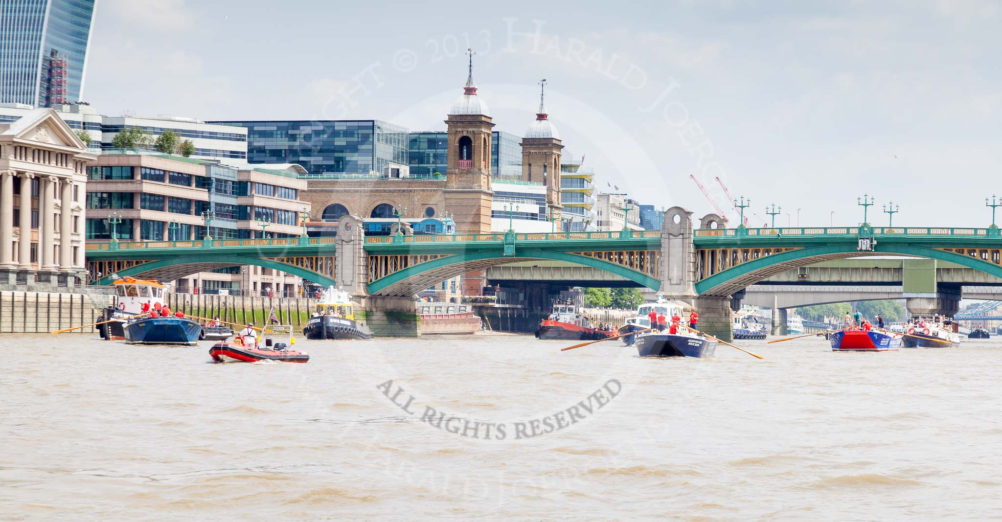 TOW River Thames Barge Driving Race 2013: Barges approaching from Southwark Bridge, from left barge "Diana", by Trinity Buoy Wharf, barge "Blackwall", by the Port of London Authority, and barge "Steve Faldo" by Capital Pleasure Boats..
River Thames between Greenwich and Westminster,
London,

United Kingdom,
on 13 July 2013 at 13:56, image #405