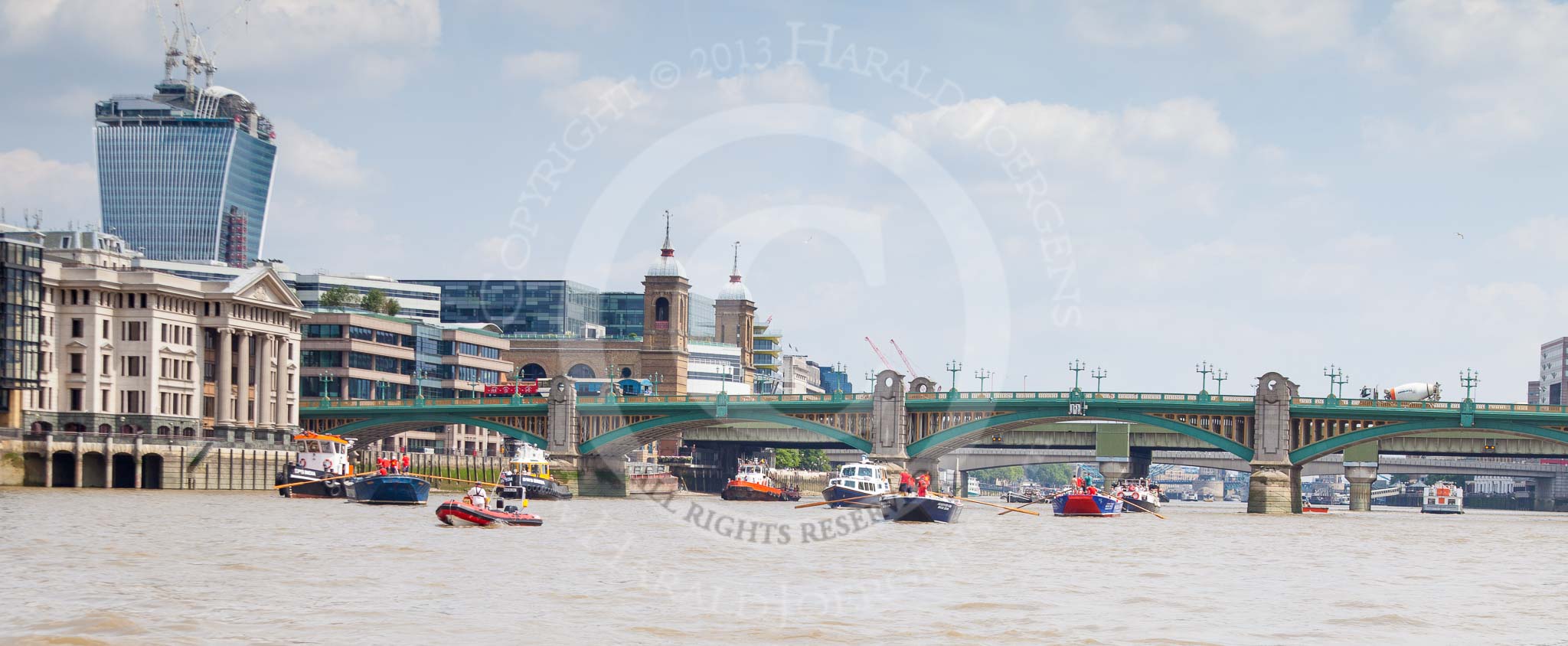 TOW River Thames Barge Driving Race 2013: Barges approaching from Southwark Bridge, from left barge "Diana", by Trinity Buoy Wharf, barge "Blackwall", by the Port of London Authority, and barge "Steve Faldo" by Capital Pleasure Boats..
River Thames between Greenwich and Westminster,
London,

United Kingdom,
on 13 July 2013 at 13:56, image #406