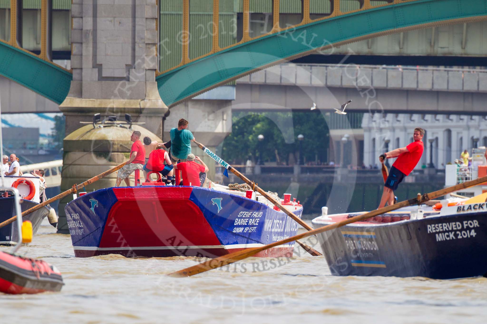 TOW River Thames Barge Driving Race 2013: Barge "Blackwall", by the Port of London Authority, followed by barge "Steve Faldo" by Capital Pleasure Boats. Behind them Cannon Street Railway Bridge and Southwark Bridge..
River Thames between Greenwich and Westminster,
London,

United Kingdom,
on 13 July 2013 at 13:57, image #409