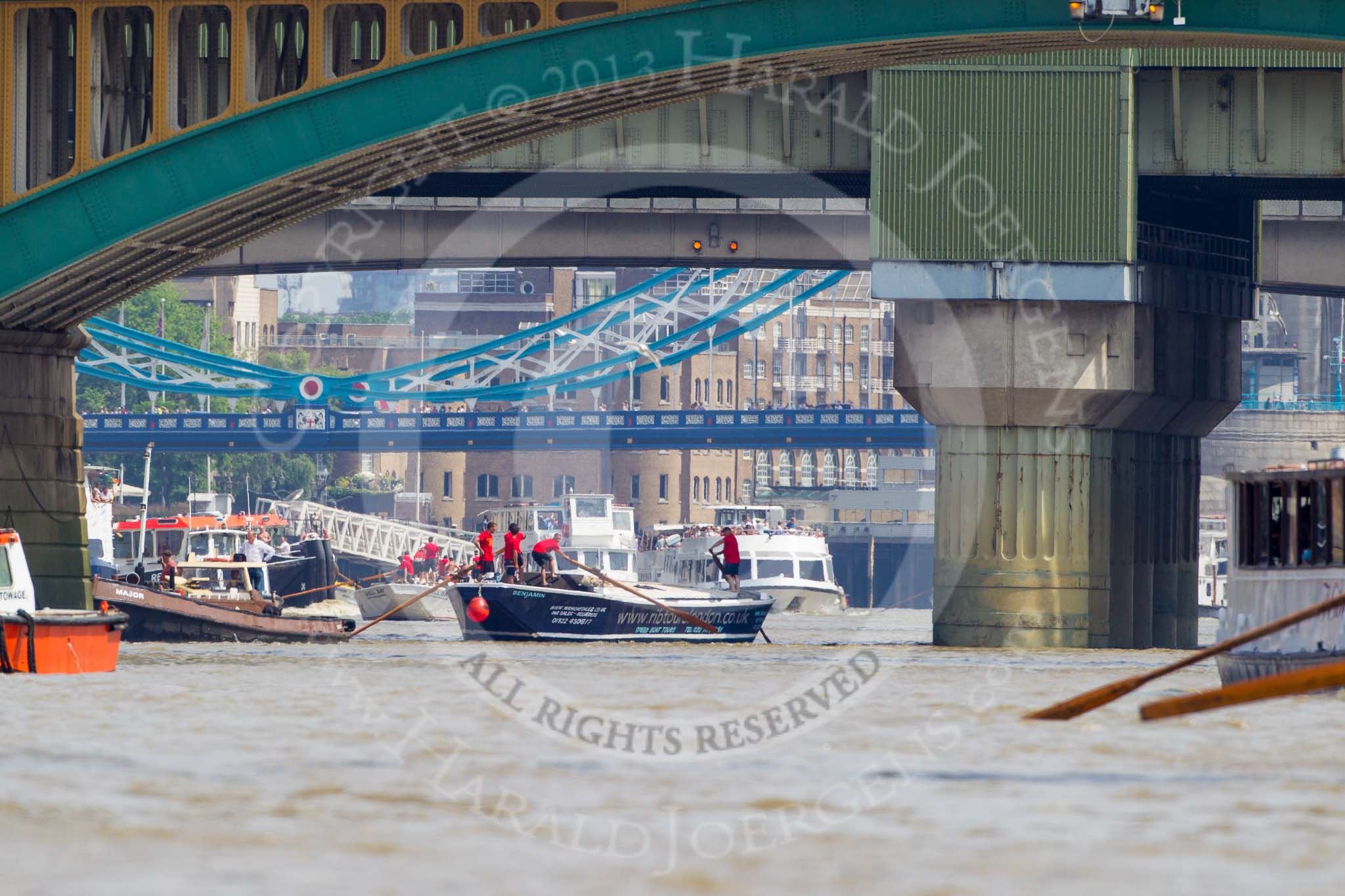 TOW River Thames Barge Driving Race 2013: Barge "Benjamin", by London Party Boats, followed by barge "Shell Bay" by South Dock Marina, passing London Bridge. In the foreground Cannon Street Railway Bridge and Southwark Bridge..
River Thames between Greenwich and Westminster,
London,

United Kingdom,
on 13 July 2013 at 13:57, image #412