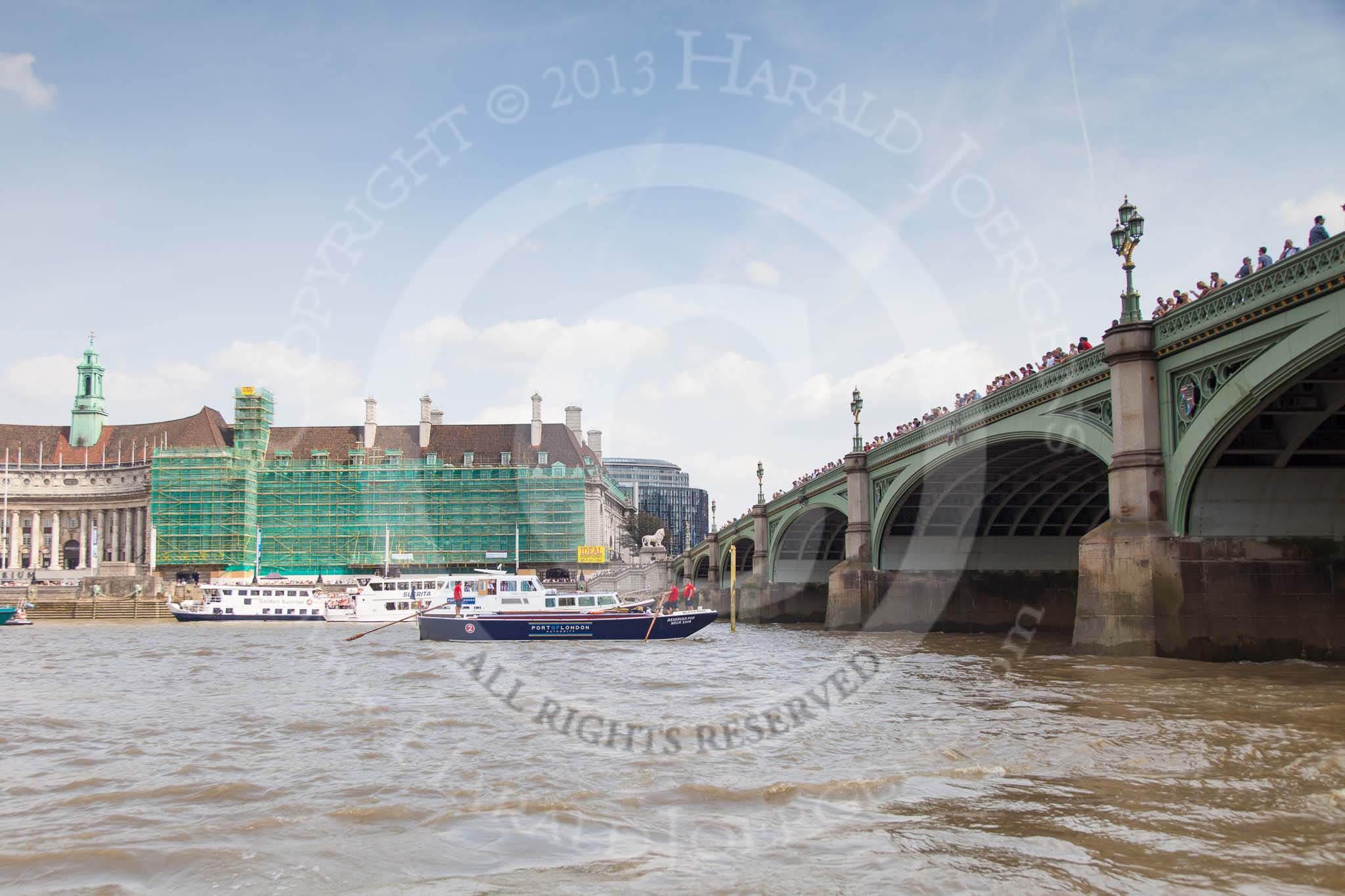 TOW River Thames Barge Driving Race 2013: Barge "Blackwall", by the Port of London Authority, about to cross the finish line at Westminster Bridge as the race winner..
River Thames between Greenwich and Westminster,
London,

United Kingdom,
on 13 July 2013 at 14:16, image #420