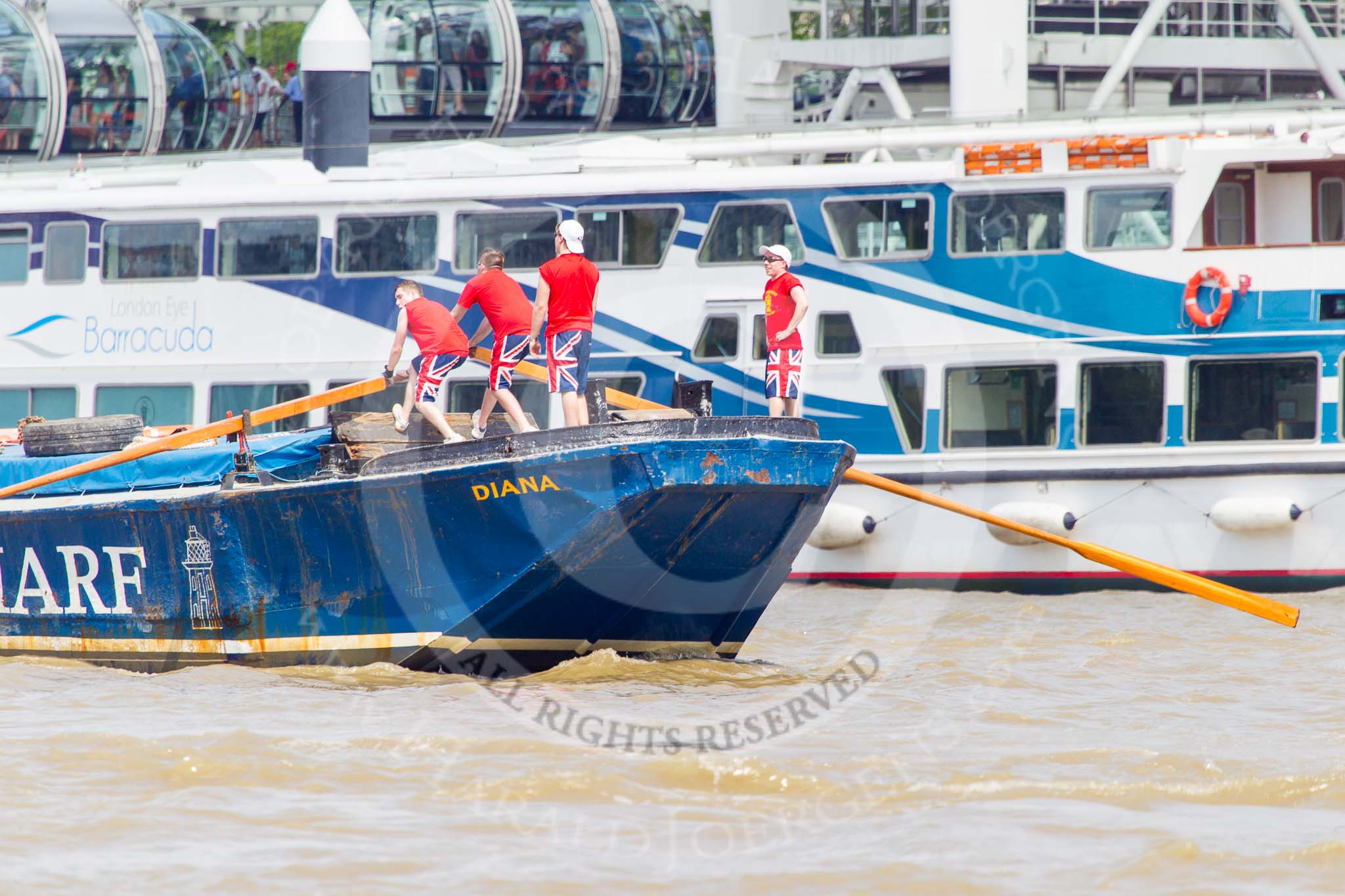 TOW River Thames Barge Driving Race 2013: Barge "Diana", by Trinity Buoy Wharf, at the London Eye, close to the finish of the race at Westminster Bridge..
River Thames between Greenwich and Westminster,
London,

United Kingdom,
on 13 July 2013 at 14:17, image #422