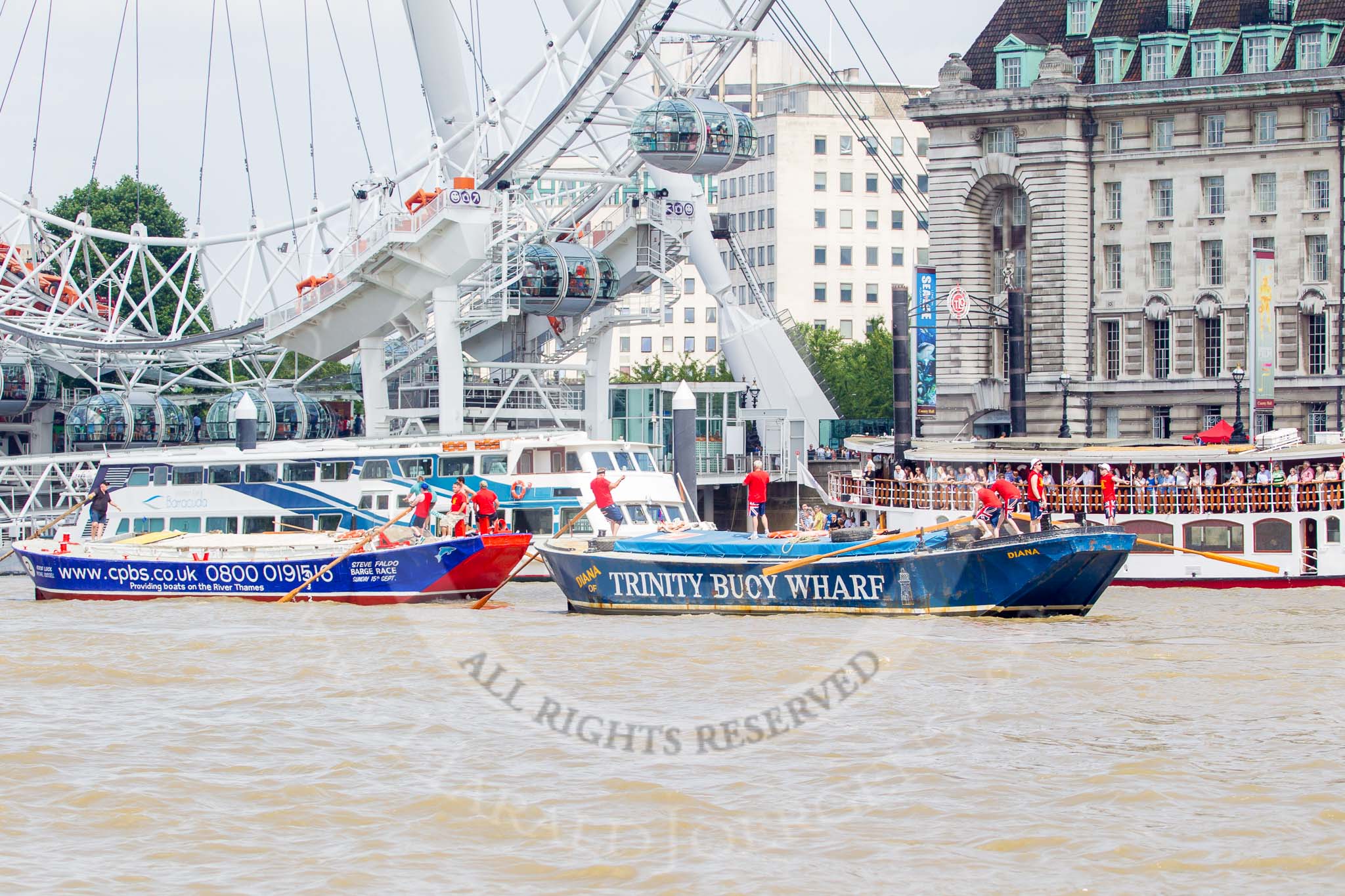 TOW River Thames Barge Driving Race 2013: Barge "Diana", by Trinity Buoy Wharf, at the London Eye, followed by barge "Steve Faldo" by Capital Pleasure Boats, close to the finish of the race at Westminster Bridge..
River Thames between Greenwich and Westminster,
London,

United Kingdom,
on 13 July 2013 at 14:17, image #424