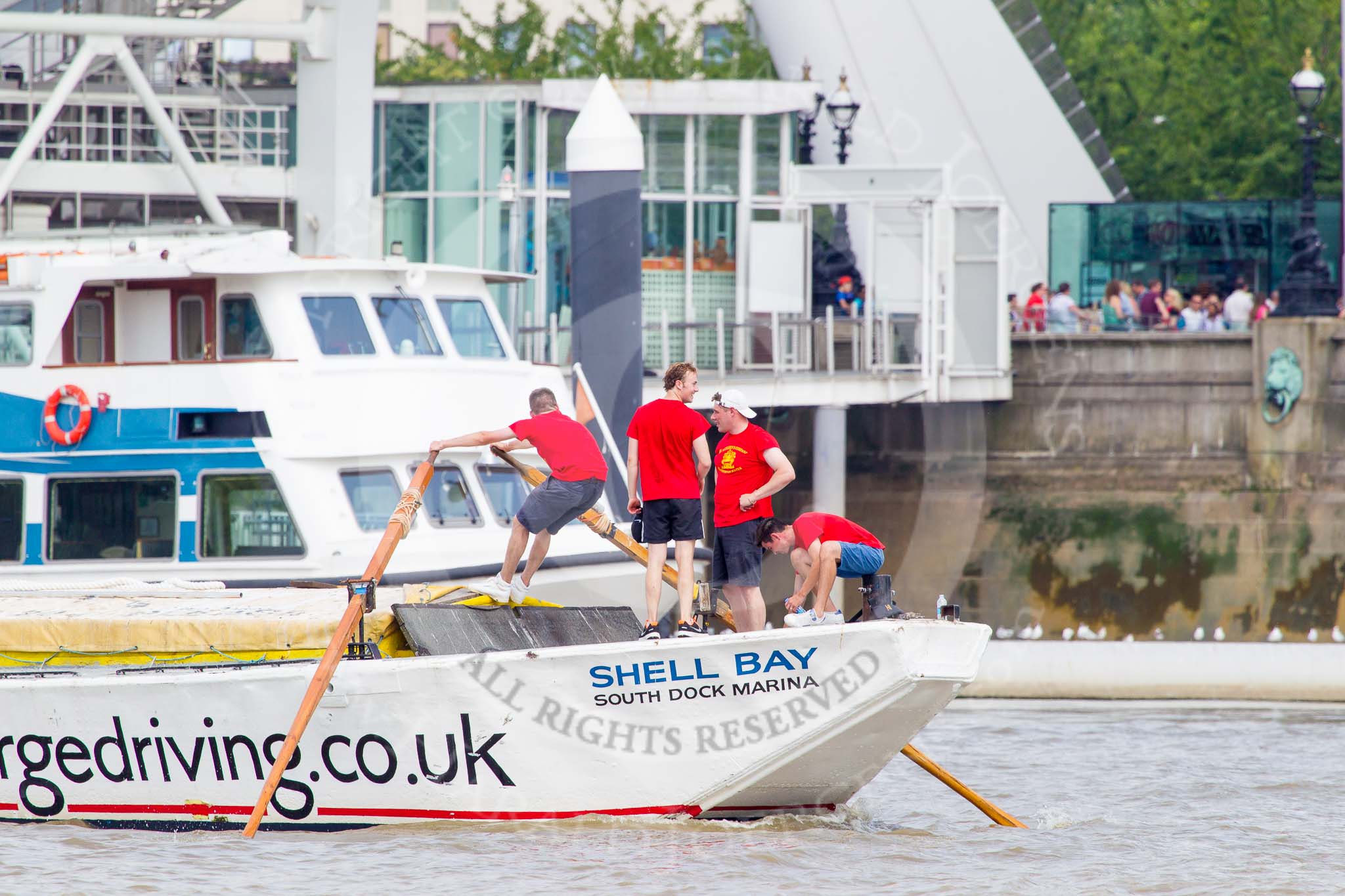 TOW River Thames Barge Driving Race 2013: Barge ""Shell Bay" by South Dock Marina, at the London Eye, close to the finish of the race at Westminster Bridge..
River Thames between Greenwich and Westminster,
London,

United Kingdom,
on 13 July 2013 at 14:23, image #442