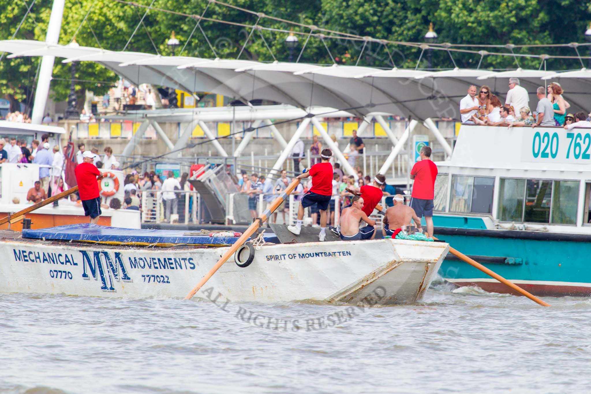 TOW River Thames Barge Driving Race 2013: Barge "Spirit of Mountabatten", by Mechanical Movements and Enabling Services Ltd, at the London Eye, close to the finish of the race at Westminster Bridge..
River Thames between Greenwich and Westminster,
London,

United Kingdom,
on 13 July 2013 at 14:25, image #452