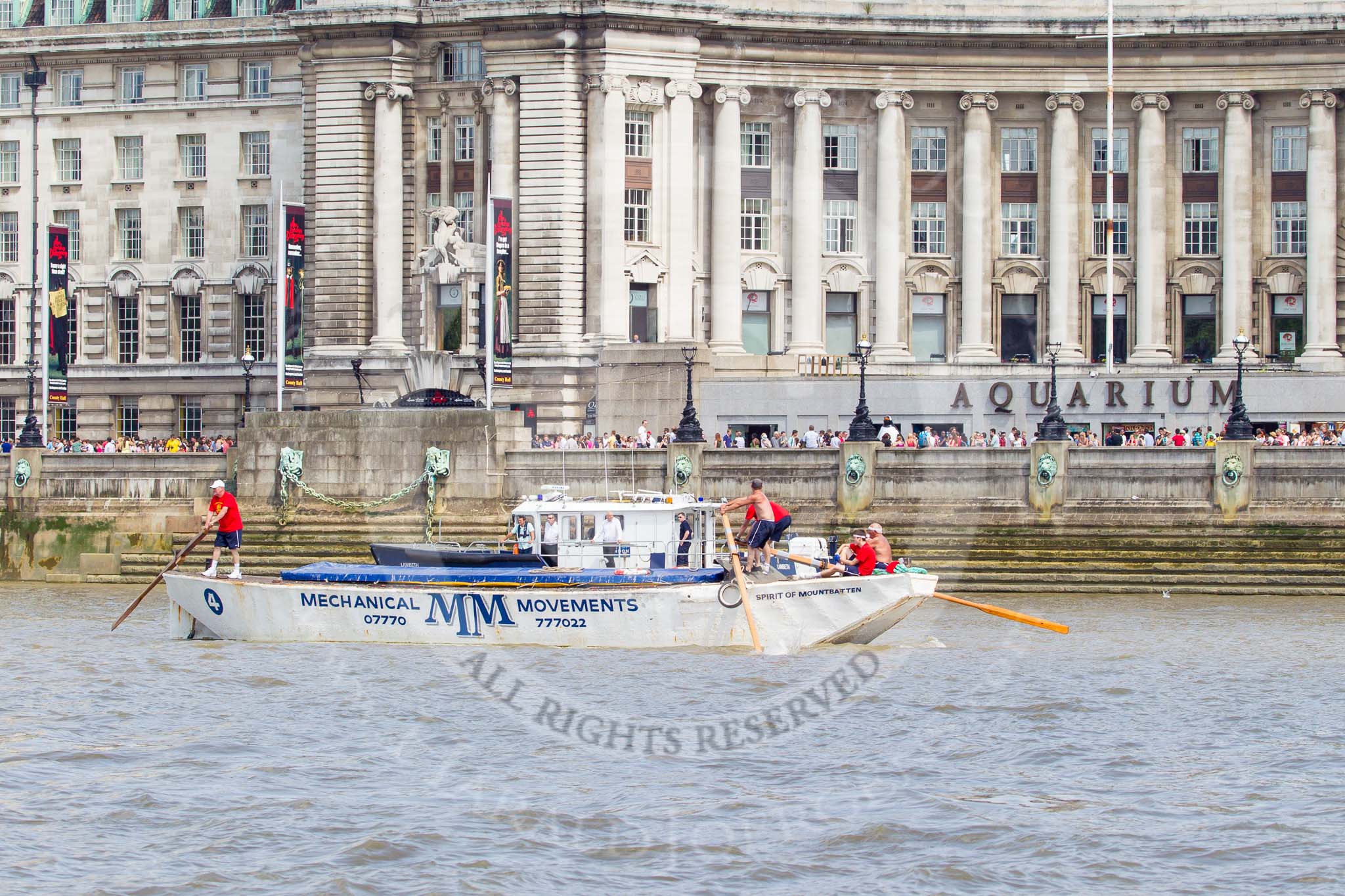 TOW River Thames Barge Driving Race 2013: Barge "Spirit of Mountabatten", by Mechanical Movements and Enabling Services Ltd, at the London Aquarium, close to the finish of the race at Westminster Bridge..
River Thames between Greenwich and Westminster,
London,

United Kingdom,
on 13 July 2013 at 14:26, image #458