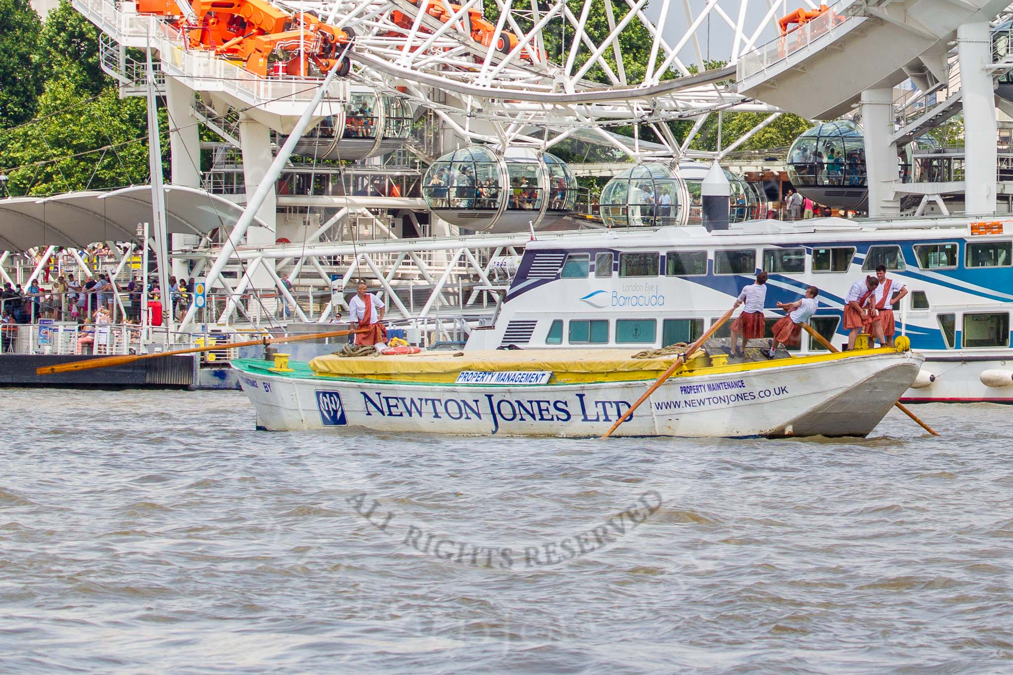 TOW River Thames Barge Driving Race 2013: Barge "Hoppy", by GPS Fabrication, at the London Eye, close to the finish of the race at Westminster Bridge..
River Thames between Greenwich and Westminster,
London,

United Kingdom,
on 13 July 2013 at 14:26, image #460