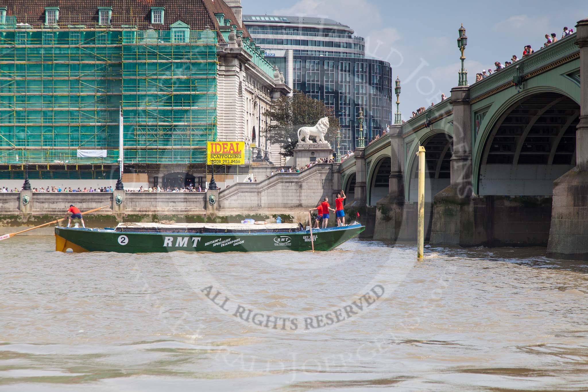 TOW River Thames Barge Driving Race 2013: Barge "Jane", by the RMT Union, about to cross the finish line of the race at Westminster Bridge..
River Thames between Greenwich and Westminster,
London,

United Kingdom,
on 13 July 2013 at 14:29, image #474