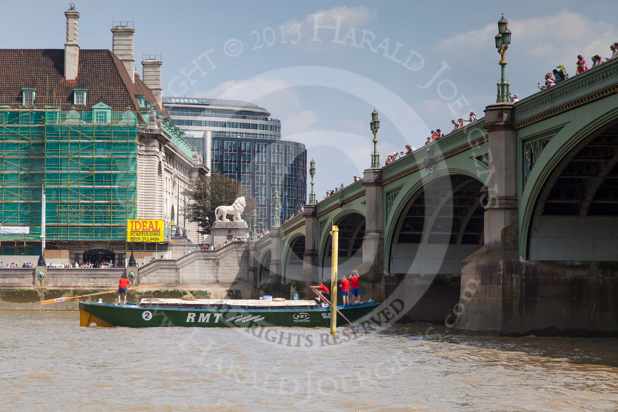 Photo 1307131429525D24503HaraldJoergens TOW River Thames Barge Driving Race 2013: Barge "Jane", by the RMT Union, crossing the finish line of the race at Westminster Bridge..
River Thames between Greenwich and Westminster,
London,
United Kingdom,
on 13 July 2013 at 14:30, image #475