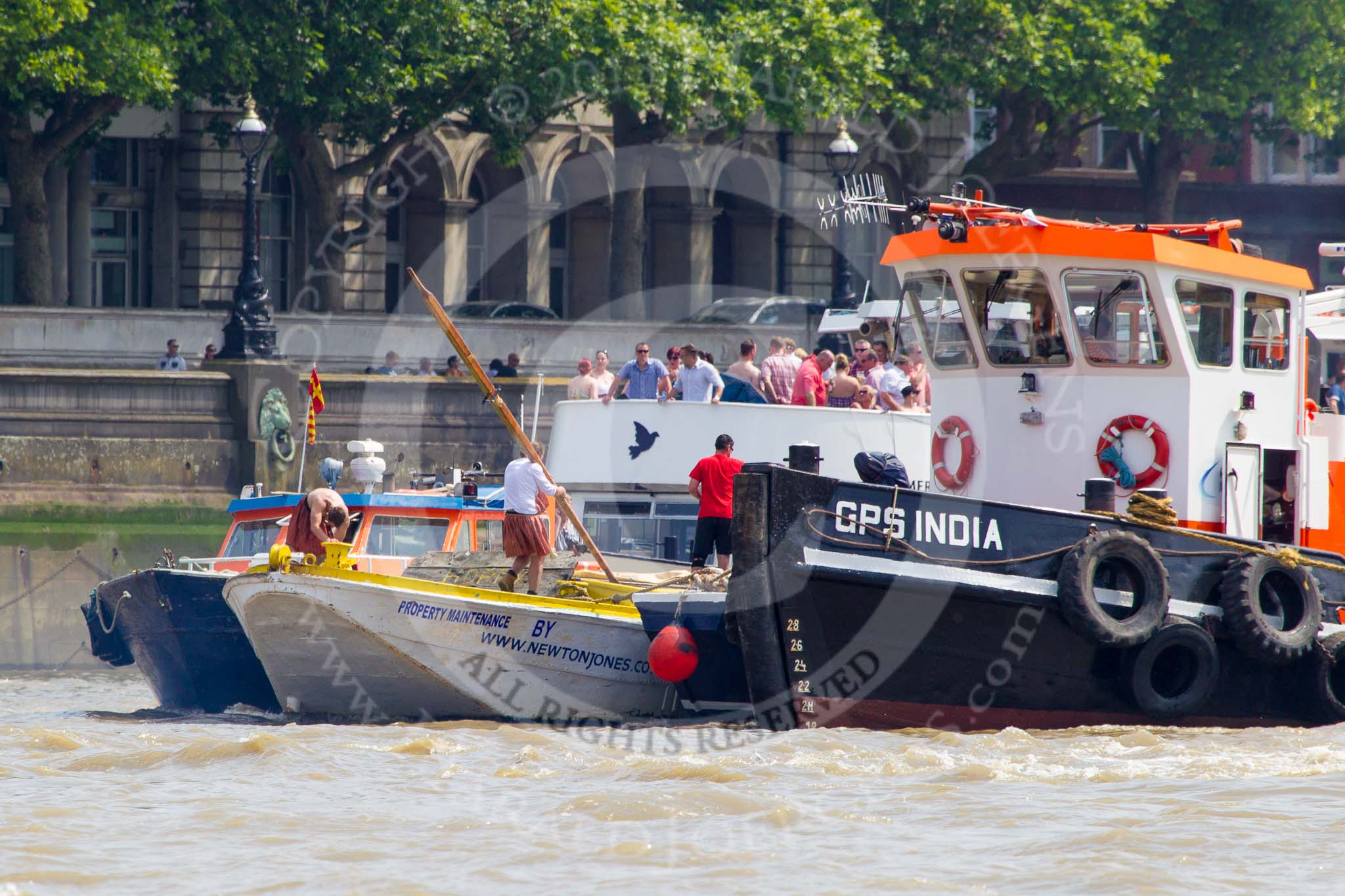 TOW River Thames Barge Driving Race 2013: GPS Marine tug "GPS India", barge "Hoppy", by GPS Fabrication, and barge "Benjamin", by London Party Boats, behind the fiish line of the race at Westminster Bridge..
River Thames between Greenwich and Westminster,
London,

United Kingdom,
on 13 July 2013 at 14:35, image #488