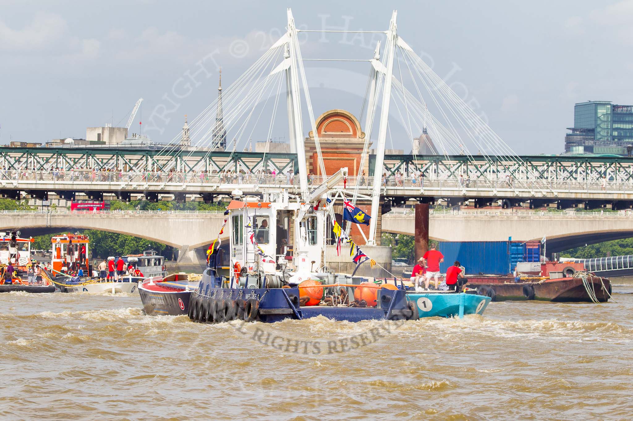 TOW River Thames Barge Driving Race 2013: Barges on the way back to Greenwich, passing Hungerford Bridge..
River Thames between Greenwich and Westminster,
London,

United Kingdom,
on 13 July 2013 at 14:43, image #517