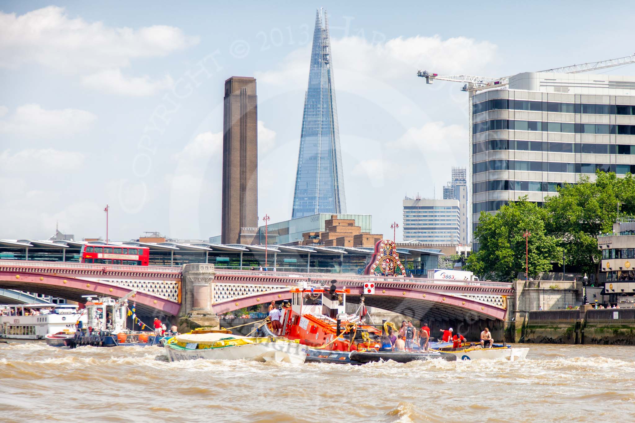 TOW River Thames Barge Driving Race 2013: Barges on the way back to Greenwich, passing Blackfriars Bridge, with the "Shard" building in the background..
River Thames between Greenwich and Westminster,
London,

United Kingdom,
on 13 July 2013 at 14:51, image #536