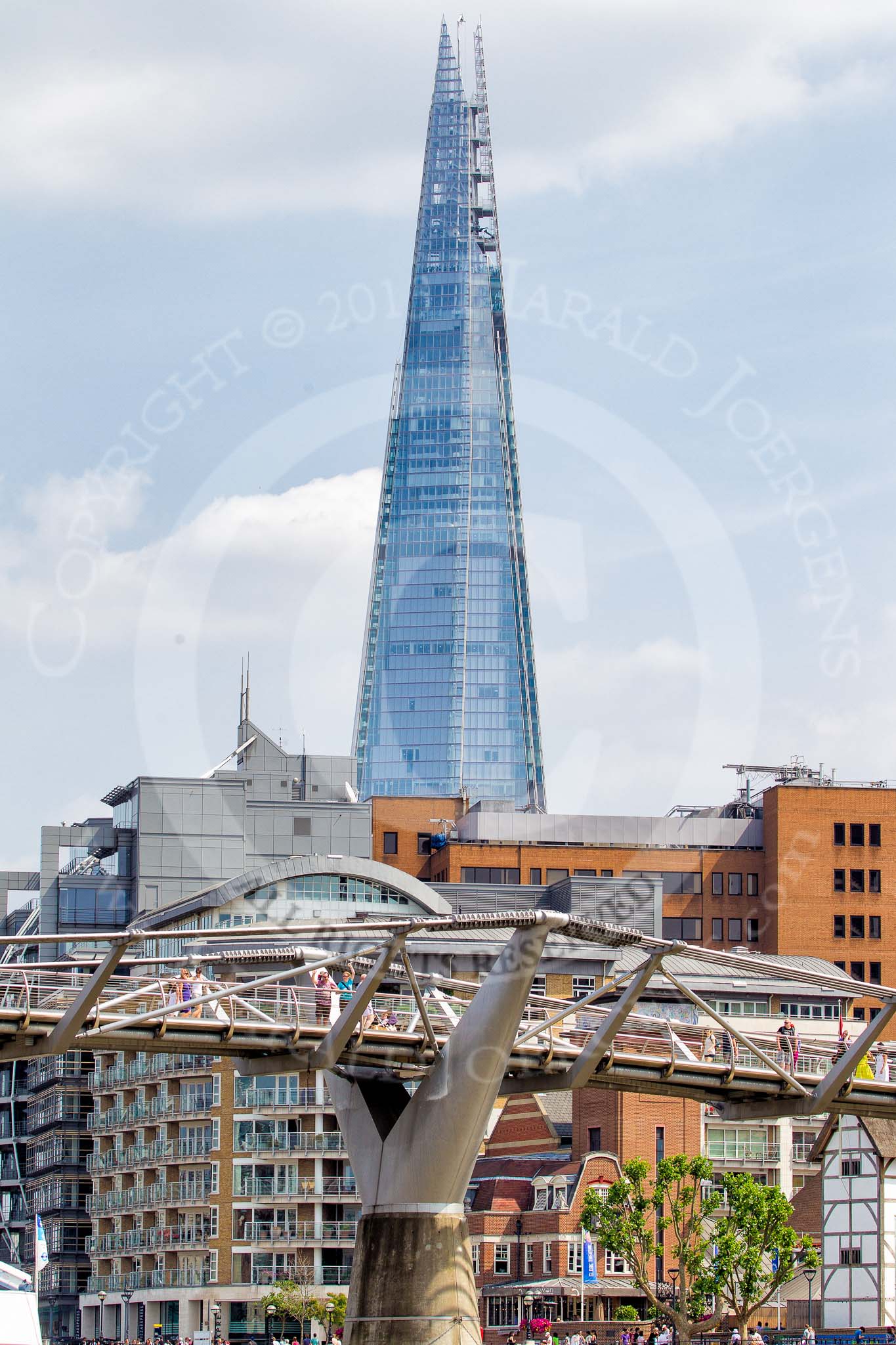 TOW River Thames Barge Driving Race 2013: The "Gherkin" building behind the Millenium Footbridge, seen from the river..
River Thames between Greenwich and Westminster,
London,

United Kingdom,
on 13 July 2013 at 14:53, image #541