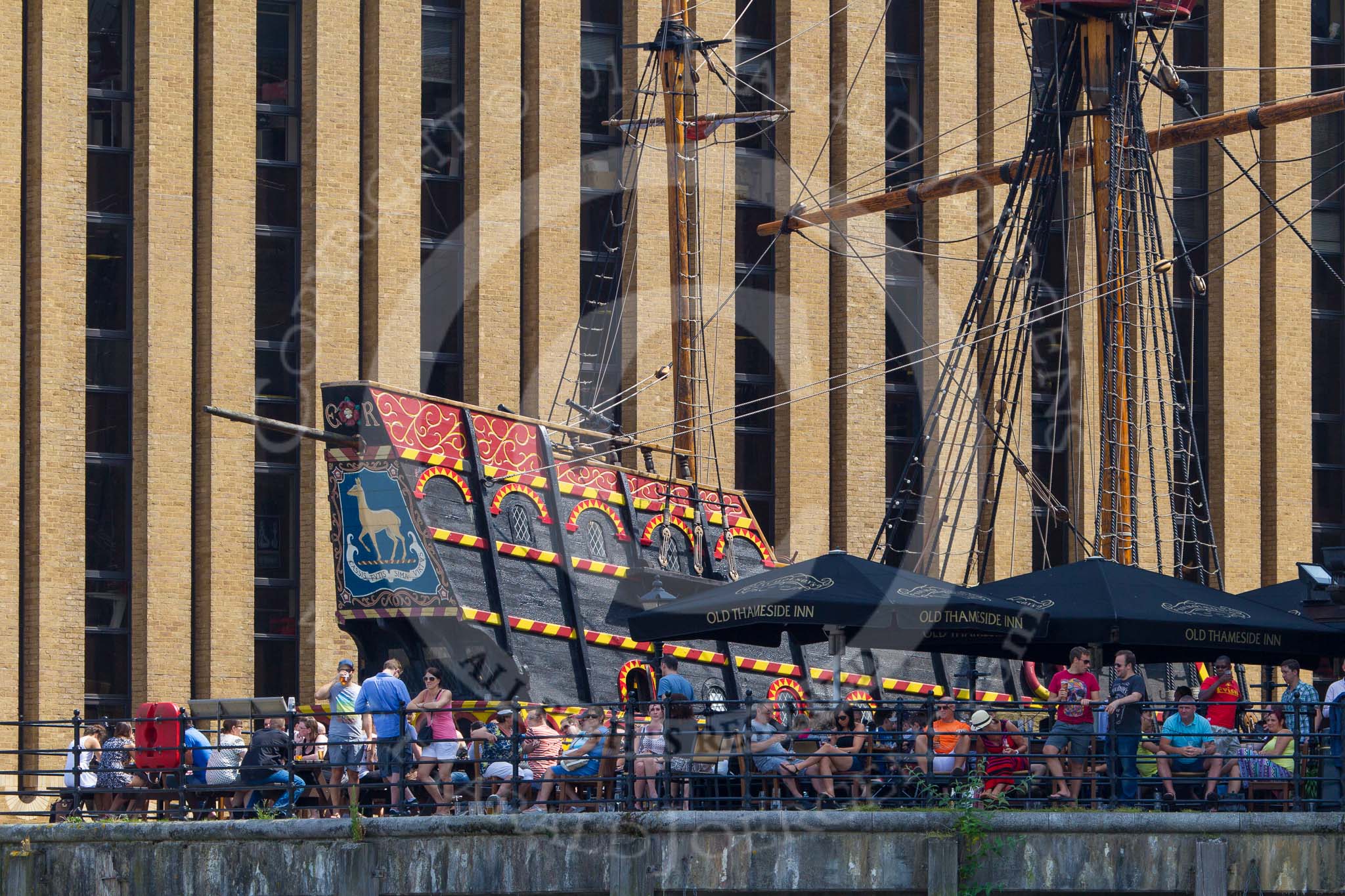 TOW River Thames Barge Driving Race 2013: The "Golden Hind, a replica of Sir Francis Drake's Tudor vessel, and the "Old Thameside Inn" at Pickfords Wharf, London SE1, seen from the river..
River Thames between Greenwich and Westminster,
London,

United Kingdom,
on 13 July 2013 at 14:57, image #545