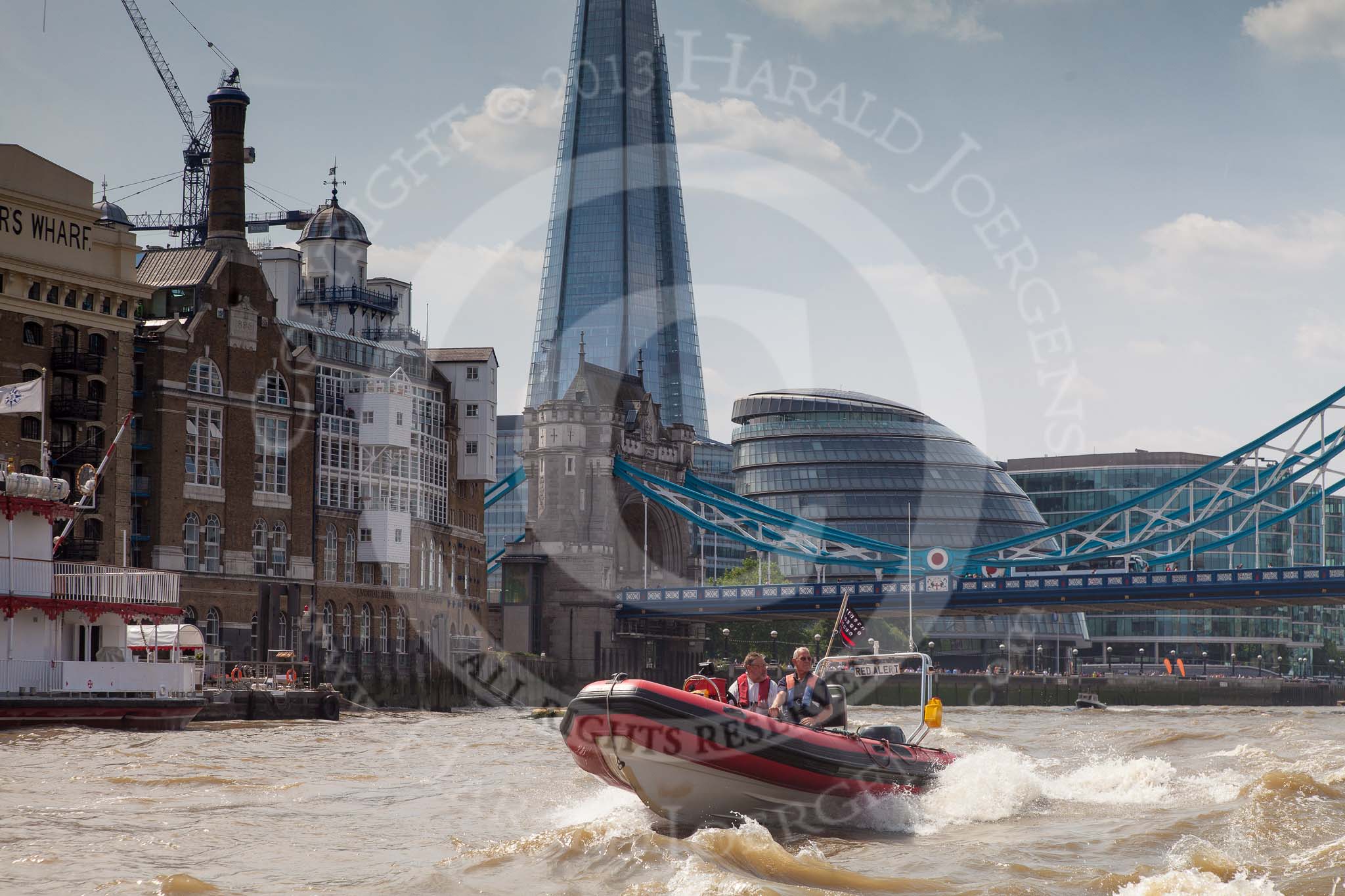 TOW River Thames Barge Driving Race 2013: RIB "Red Alert" passing Butler's Wharf, with  Tower Bridge, City Hall, and the "Shard" building behind..
River Thames between Greenwich and Westminster,
London,

United Kingdom,
on 13 July 2013 at 15:02, image #546