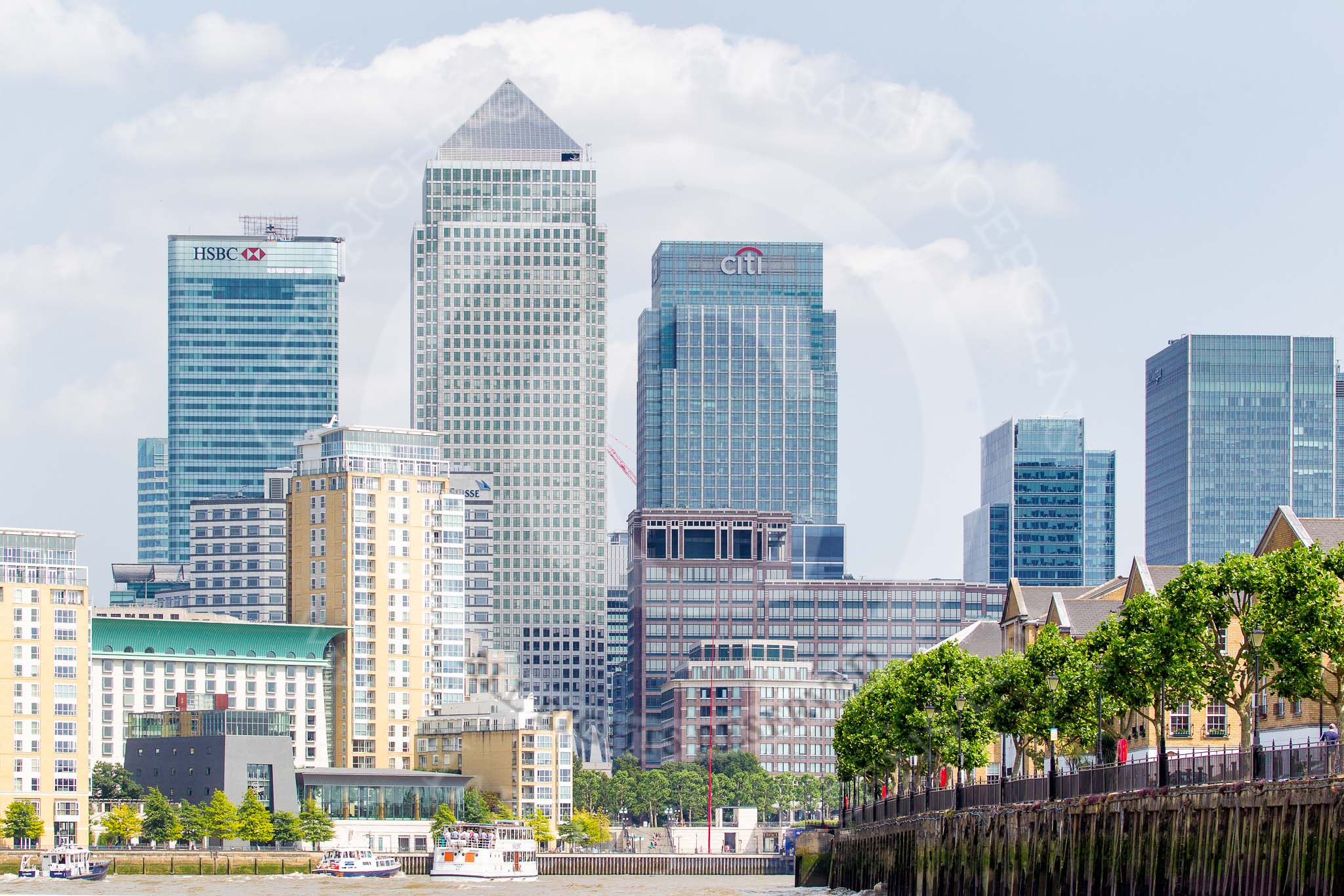 TOW River Thames Barge Driving Race 2013: The skyscrapers at Canary Wharf, seen from the river, looking along Sovereign Crescent, London SO16..
River Thames between Greenwich and Westminster,
London,

United Kingdom,
on 13 July 2013 at 15:10, image #550