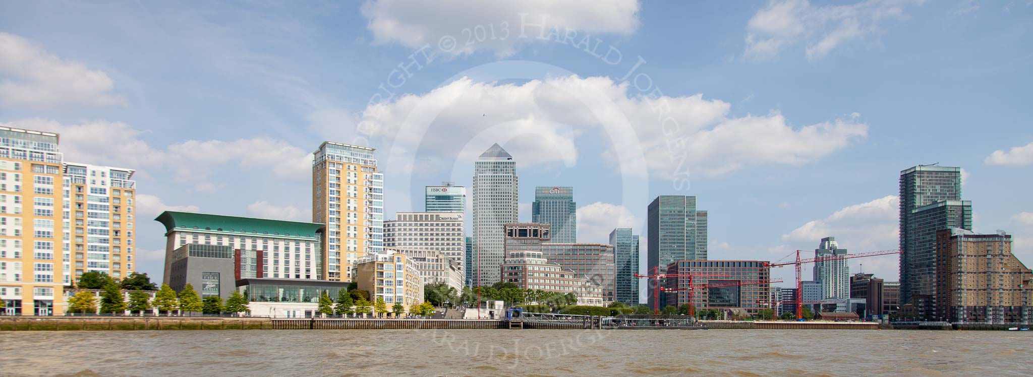 TOW River Thames Barge Driving Race 2013: The skyscrapers at Canary Wharf seen from the river..
River Thames between Greenwich and Westminster,
London,

United Kingdom,
on 13 July 2013 at 15:12, image #552