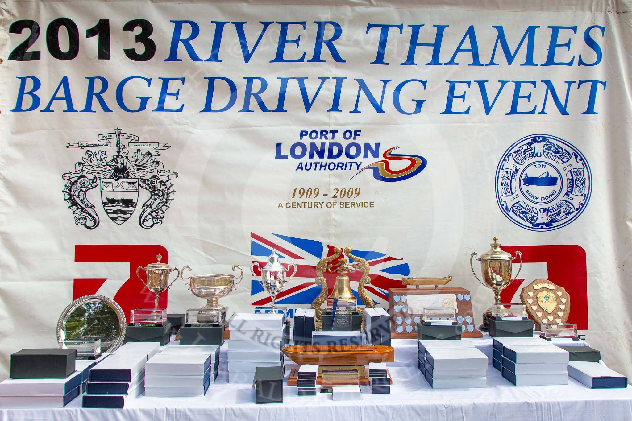 TOW River Thames Barge Driving Race 2013: The prizes for the 2013 Thames Barge Driving Race on the presentation stage, before the price-giving..
River Thames between Greenwich and Westminster,
London,

United Kingdom,
on 13 July 2013 at 15:39, image #556