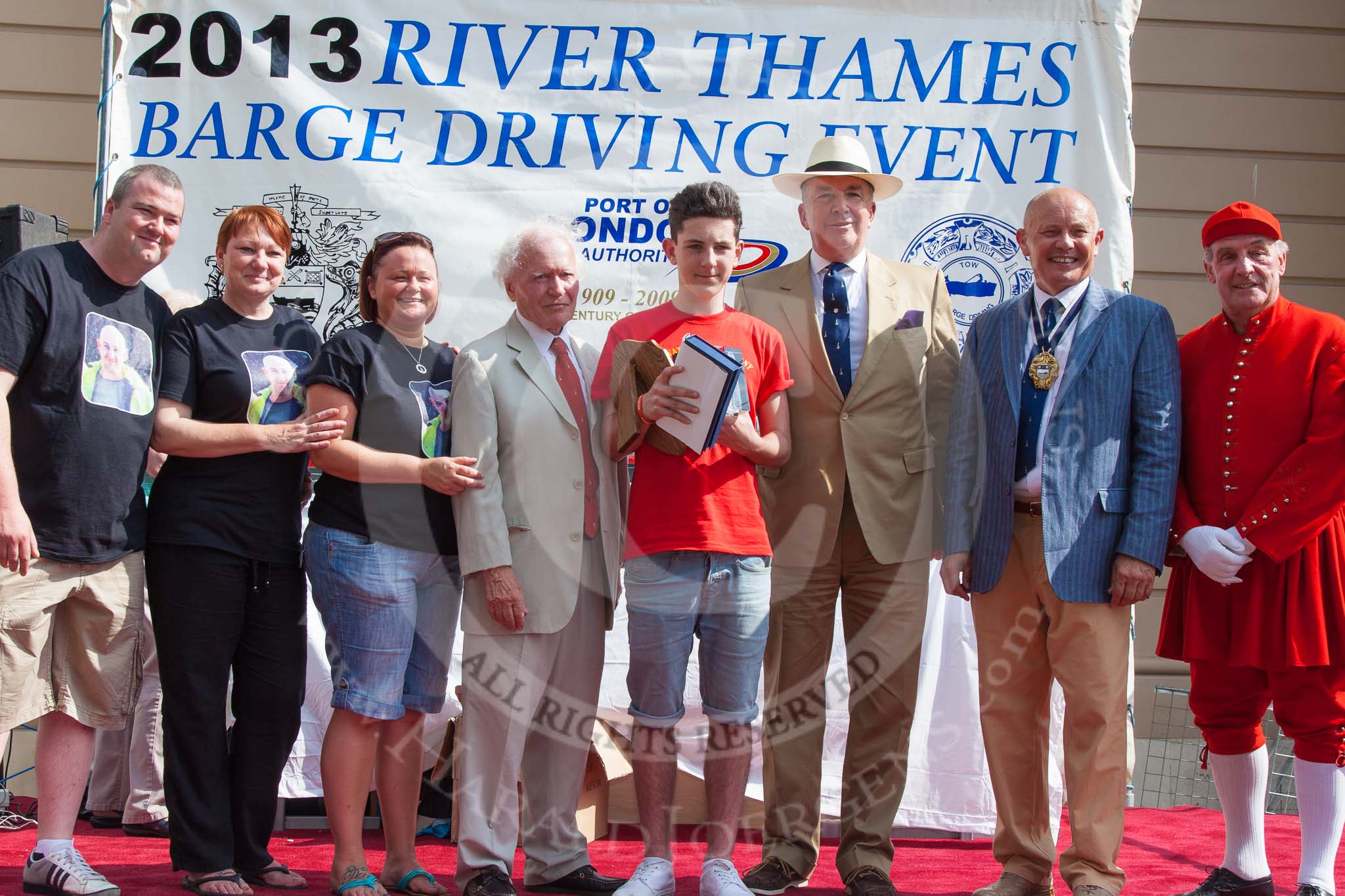 TOW River Thames Barge Driving Race 2013: The price for the youngest apprentice goes to a member of the crew of barge "Darren Lacey", by Princess Pocahontas - J. Smith, aged 16 years and 11 months..
River Thames between Greenwich and Westminster,
London,

United Kingdom,
on 13 July 2013 at 16:20, image #568