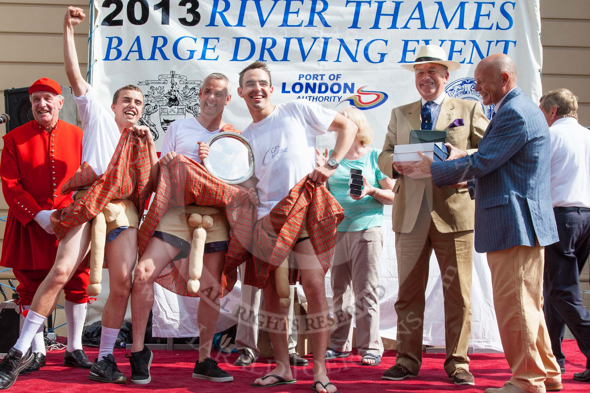 TOW River Thames Barge Driving Race 2013: The "Ken Collins Memorial Trophy", the price for the best dresses crew, goes to the crew of barge "Hoppy", by GPS Fabrication..
River Thames between Greenwich and Westminster,
London,

United Kingdom,
on 13 July 2013 at 16:21, image #570