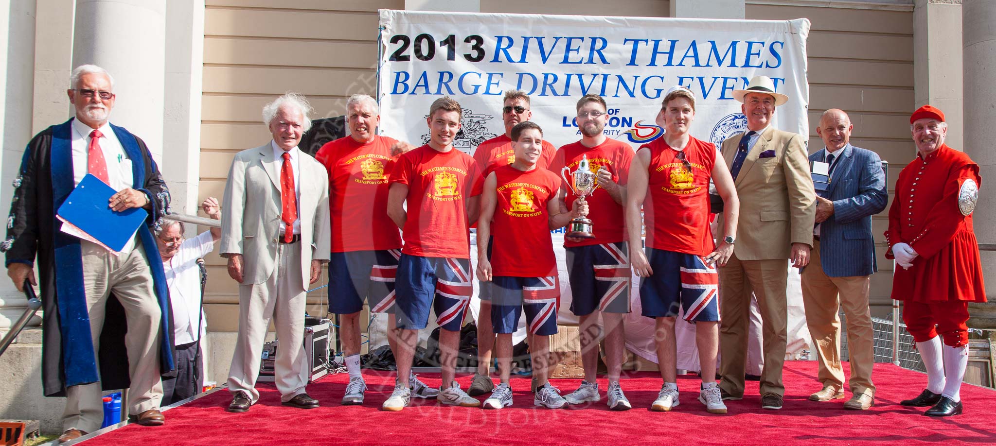 TOW River Thames Barge Driving Race 2013: The "Bill Lindley Trophy", for the second rank winner, goes to the crew of barge "Diana", by Trinity Buoy Wharf..
River Thames between Greenwich and Westminster,
London,

United Kingdom,
on 13 July 2013 at 16:25, image #576