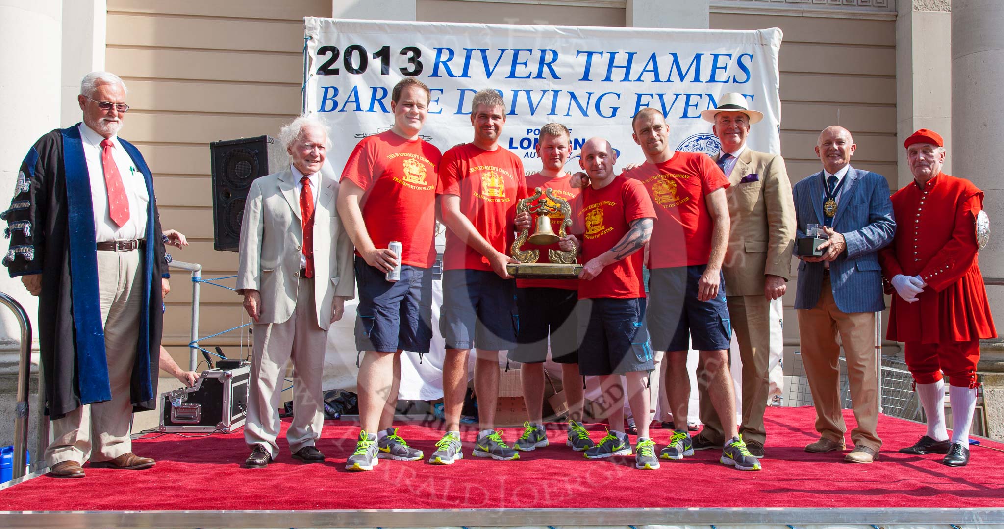 TOW River Thames Barge Driving Race 2013: The "Transport on Water Challenge Trophy", for the first overall winner, goes to the crew of barge "Blackwall", by the Port of London Authority..
River Thames between Greenwich and Westminster,
London,

United Kingdom,
on 13 July 2013 at 16:29, image #582